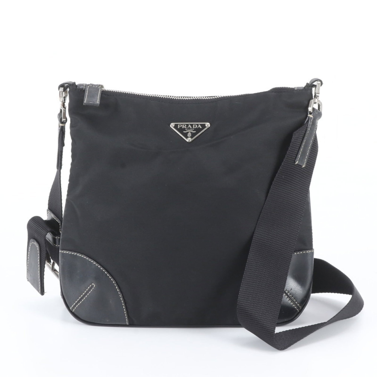 Shoulder Bag By Prada: Shoulder Bag By Prada Black Prada shoulder bag with a classic messenger design, measuring 22cm x 24cm x 8cm. This stylish bag features a sleek black color and a compact size, making it perfect for