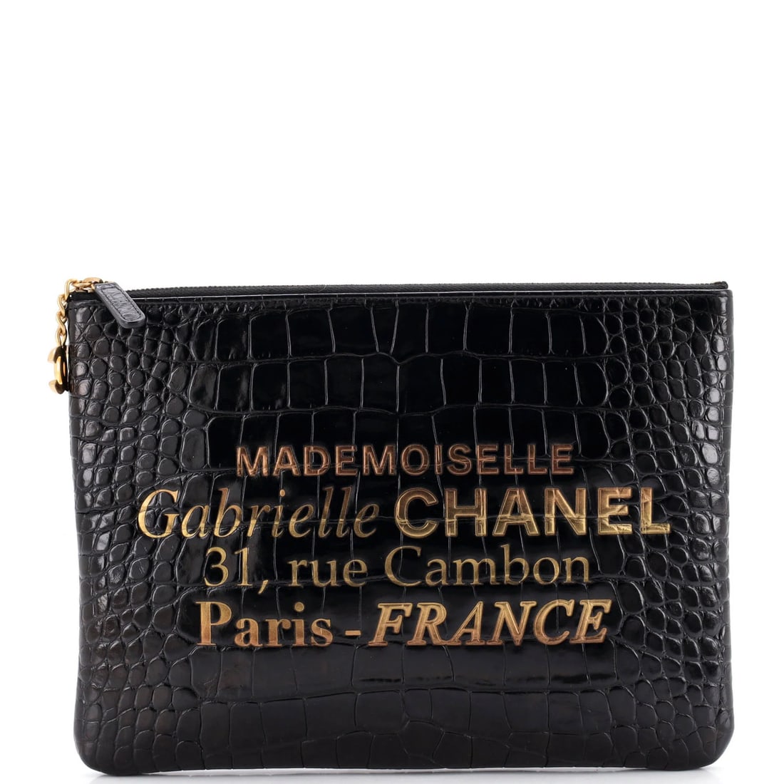 Chanel Signature O Case Pouch Printed Crocodile Embossed Calfskin Medium: Chanel Signature O Case Pouch Printed Crocodile Embossed Calfskin Medium Black leather exterior with a printed crocodile embossed design, the Chanel Signature O Case Pouch is a stylish medium-sized cl