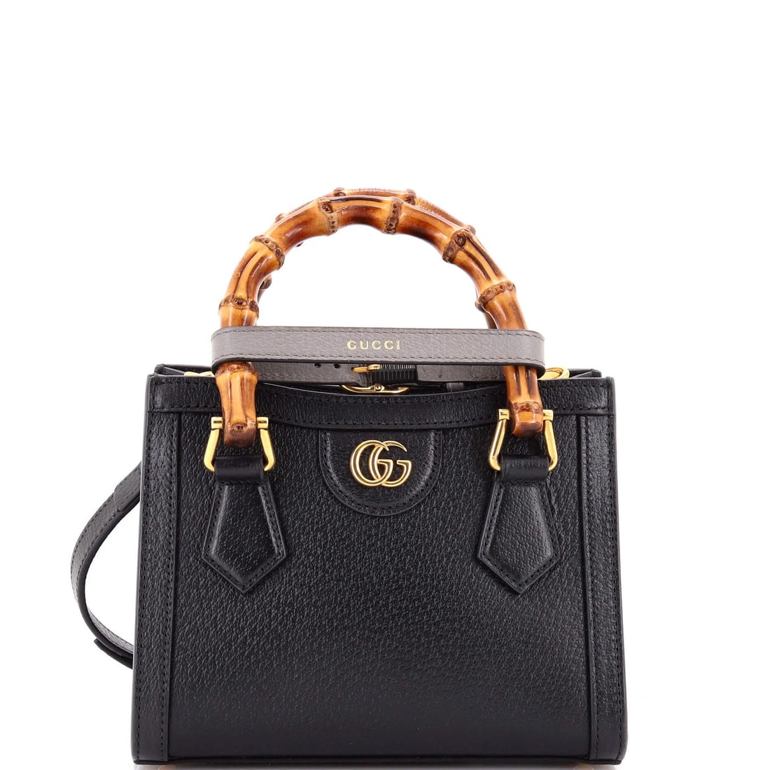 Gucci Leather Mini Bamboo Handle Tote Diana NM: Gucci Leather Mini Bamboo Handle Tote Diana NM Black leather mini cross body bag with a bamboo handle, featuring a neutral interior and gold hardware. The bag has a small size, measuring 6.5" height, 