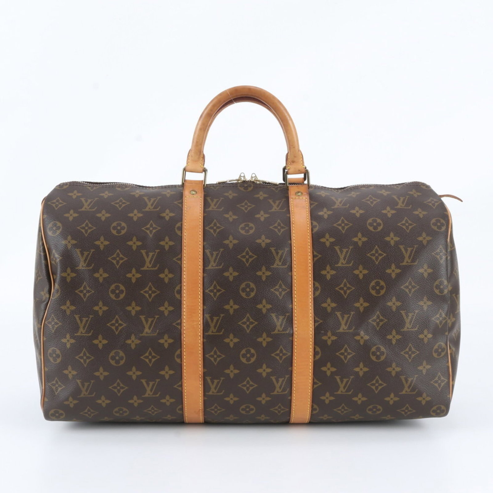 Louis Vuitton Boston Bag Tote Bag Leather Coated Canvas: Louis Vuitton Boston Bag Tote Bag Leather Coated Canvas Brown leather and coated canvas Boston bag tote from Louis Vuitton, measuring 26cm x 50cm x 22cm. This classic style features a timeless design