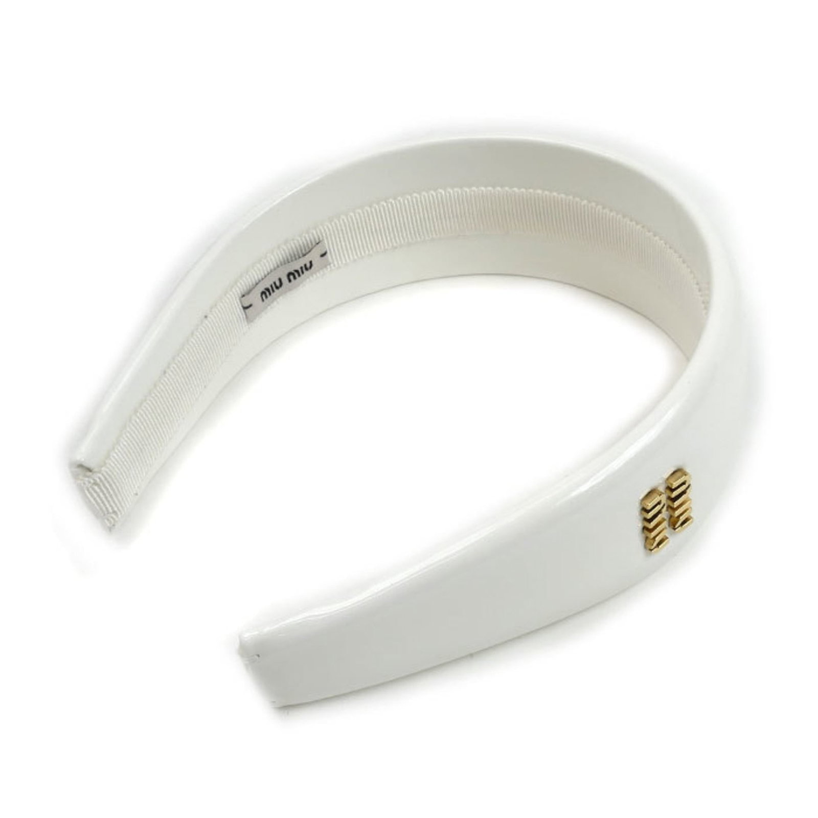 Band Patent Miu Alice Leather: Band Patent Miu Alice Leather Patent leather band from Miu Miu, featuring a white finish and measuring 4.8cm x 1.88''. This accessory comes with a dust bag for storage. The band bears a signature.