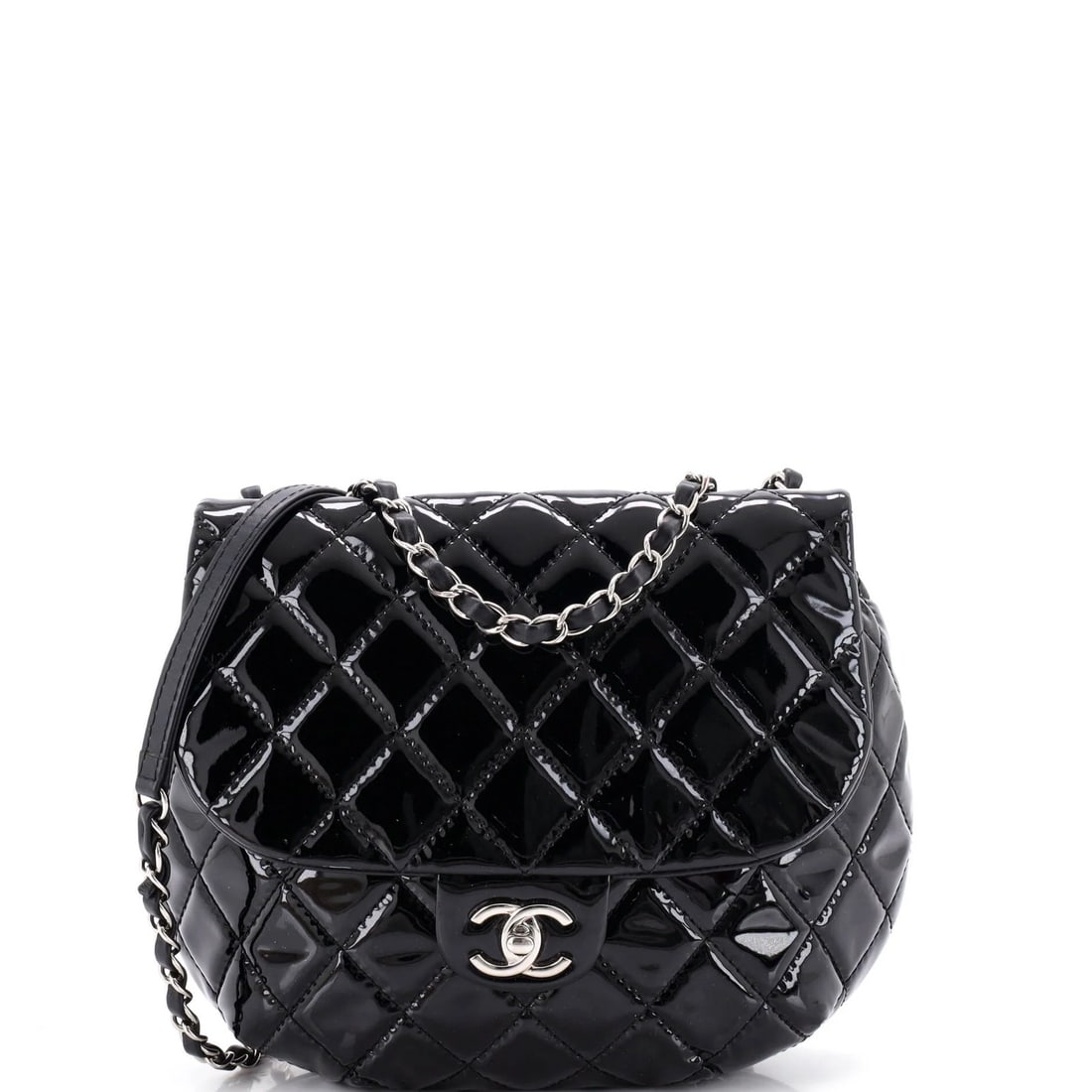 Chanel Dubai Messenger Bag Quilted Patent Medium: Chanel Dubai Messenger Bag Quilted Patent Medium Patent leather exterior adds a touch of sophistication to this medium-sized Dubai Messenger Bag from Chanel. With its quilted design and silver