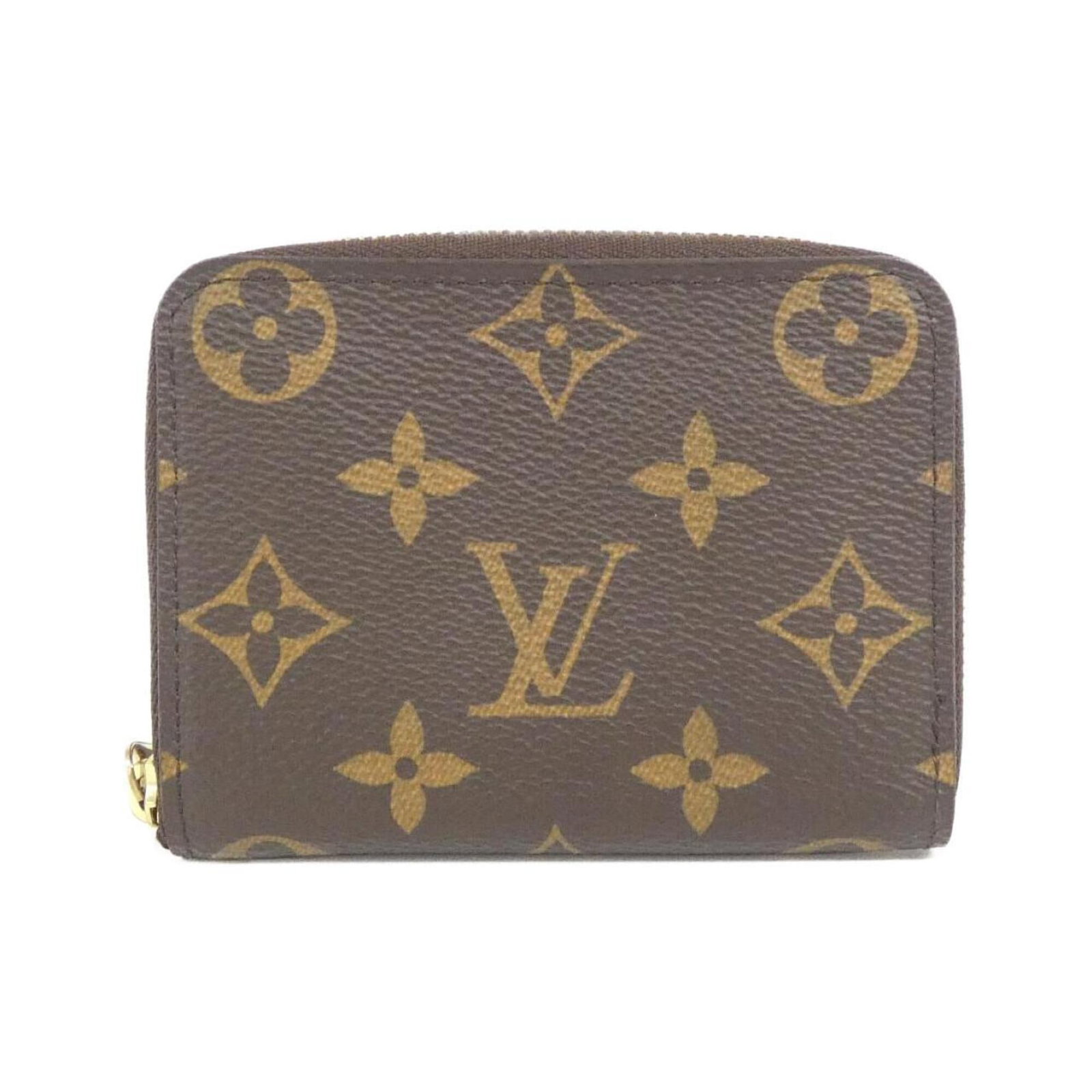 Louis Vuitton Coin Purse/ Coin Case Coated Canvas: Louis Vuitton Coin Purse/ Coin Case Coated Canvas Coated canvas construction adds a touch of sophistication to this Louis Vuitton coin purse, featuring a classic design in marron. The compact size