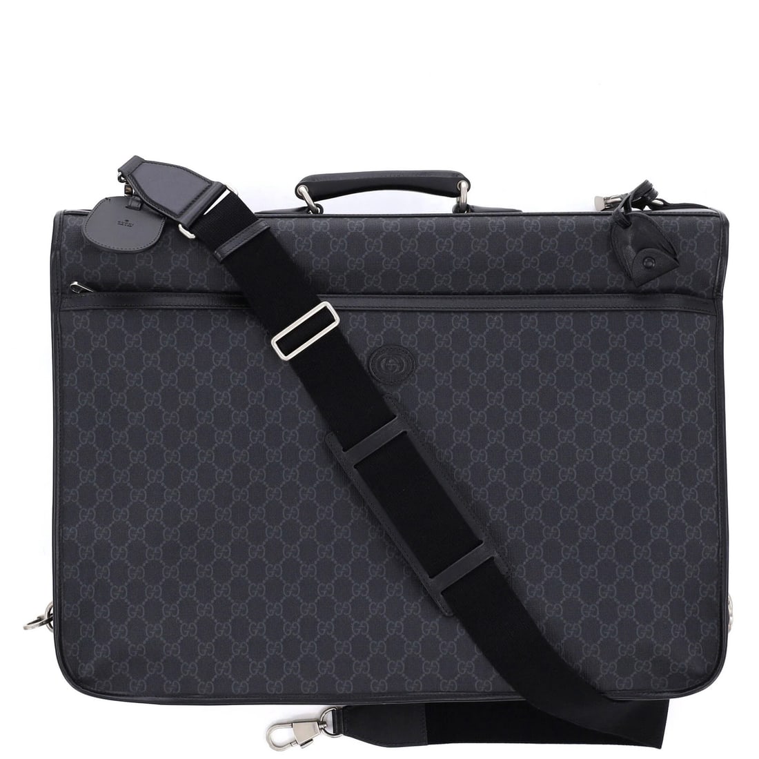 Gucci G Interlocking Retro Coated Canvas Bag: Gucci G Interlocking Retro Coated Canvas Bag Black Gucci G Interlocking Retro Coated Canvas Bag with Aged Silver Hardware, featuring a classic garment design and minor wear, is available. The bag meas