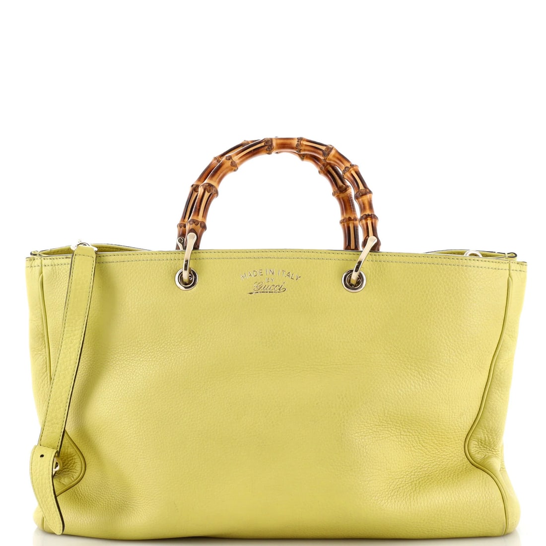 Gucci Tote Leather Large Shopper Bamboo: Gucci Tote Leather Large Shopper Bamboo Yellow Gucci Tote Leather Large Shopper Bamboo, with its iconic bamboo shopper design, boasts a spacious interior and sturdy gold-tone hardware. Measuring 12"