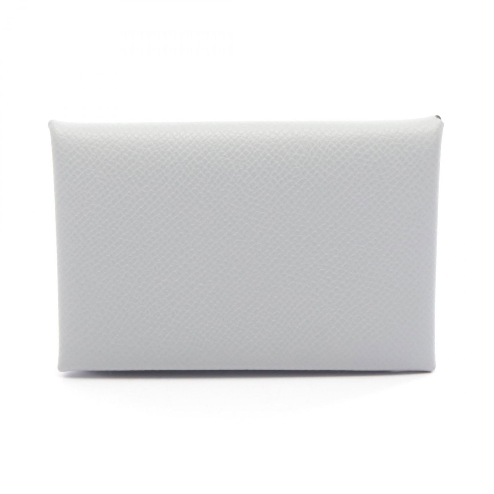 Hermes Coin Purse/ Coin Case Epsom Leather: Hermes Coin Purse/ Coin Case Epsom Leather Epsom leather craftsmanship shines in this sleek blue coin purse/coin case from Hermes, measuring 7cm x 10.5cm x 1.5cm. The subtle blue hue and refined