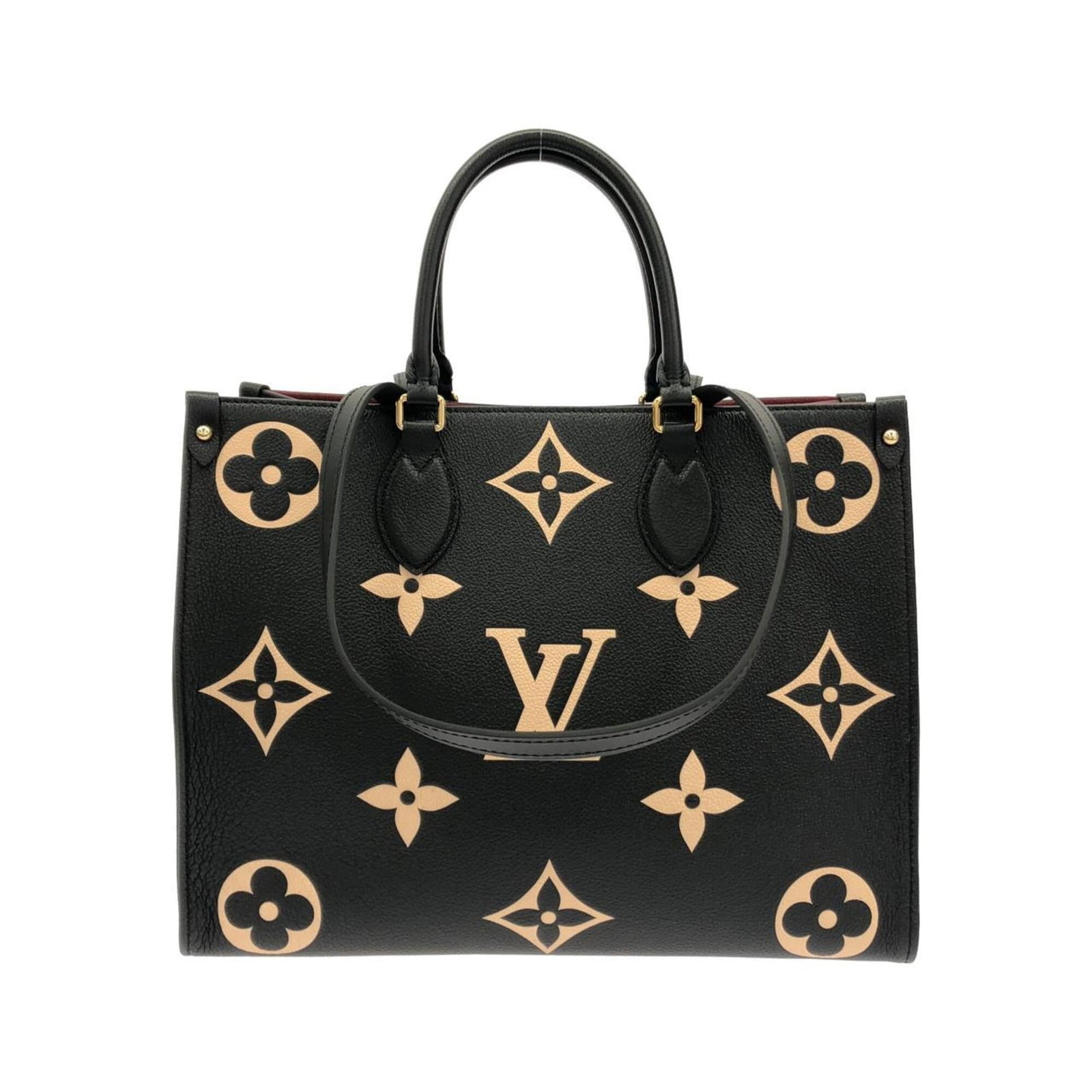Handbag Leather Louis Vuitton: Handbag Leather Louis Vuitton Calf leather handbag from Louis Vuitton, available in beige and black, with dimensions of 26cm x 34cm x 13cm. This classic design features a timeless combination of