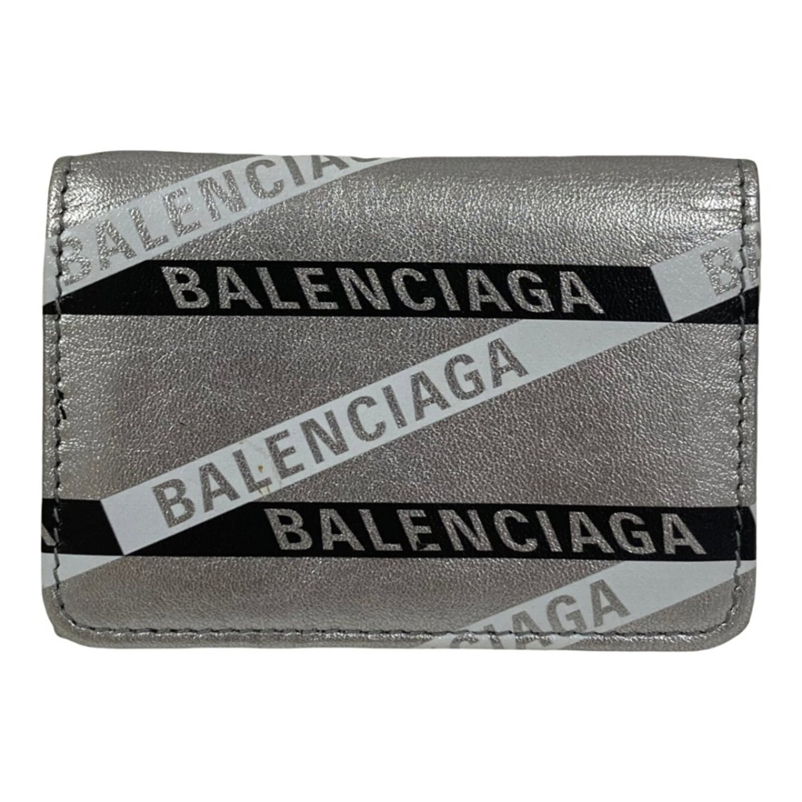 Balenciaga Wallet (Bi-Fold) Leather: Balenciaga Wallet (Bi-Fold) Leather Black leather bi-fold wallet from Balenciaga with a sleek silver finish, measuring 7cm x 9.5cm x 2cm. This stylish wallet features a classic design that adds a