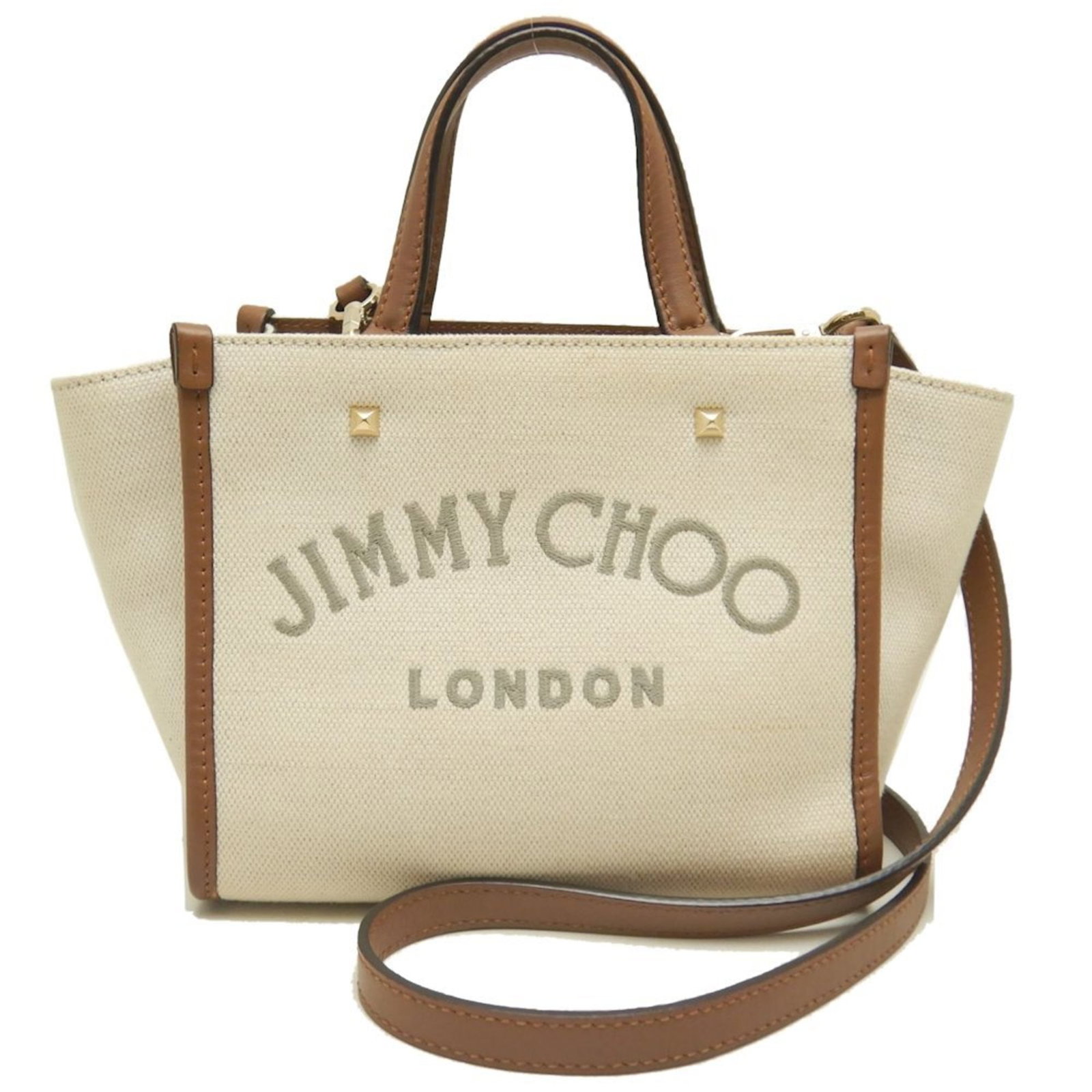 Cotton Canvas Leather Tote Bag by Jimmy Choo: Cotton Canvas Leather Tote Bag by Jimmy Choo Cotton canvas and leather come together in this stylish tote bag from Jimmy Choo, featuring a classic brown and ivory color combination and gold hardware.
