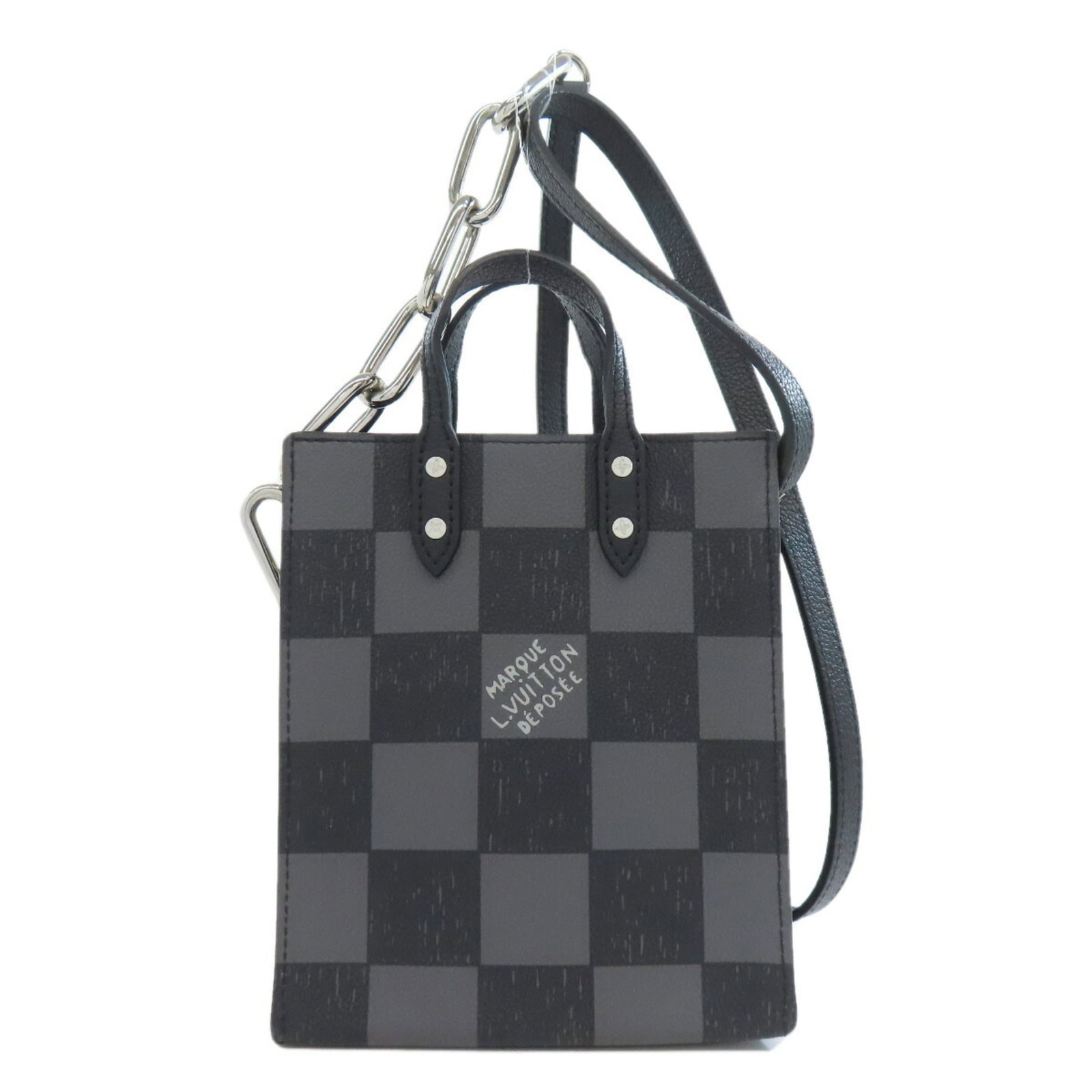 Damier Canvas Handbag Louis Vuitton: Damier Canvas Handbag Louis Vuitton Damier Canvas Handbag Louis Vuitton is made from Damier Canvas material in black color. Measuring 20cm x 16cm x 6cm, it is a compact handbag. This handbag is made