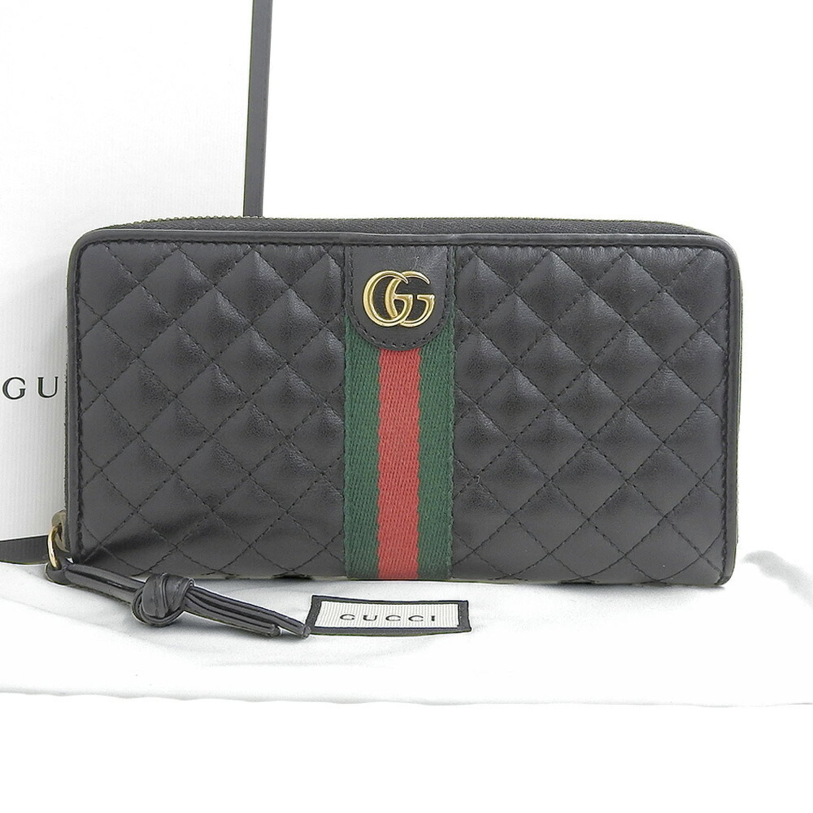 Gucci Long Wallet (Bi-Fold) Leather: Gucci Long Wallet (Bi-Fold) Leather Black leather bi-fold wallet from Gucci, measuring 10cm x 19cm x 2.5cm. Comes with a box and dust bag for storage and protection. A classic long wallet design from 