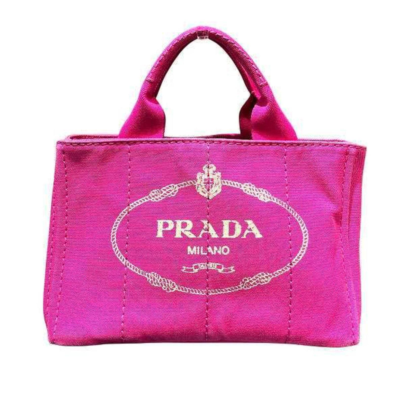 Canvas tote bag Prada handbag: Canvas tote bag Prada handbag Canvas tote bag with Prada branding, featuring a pink canvas material and a signature. Measuring 19cm x 28cm x 15cm, this 7.48'' x 11.02'' x 5.9'' tote bag has a 26cm