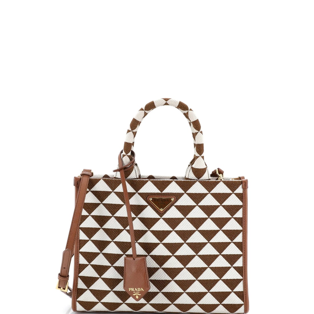 Symbole Shopper Small Prada Tote Jacquard: Symbole Shopper Small Prada Tote Jacquard Small Prada Symbole Shopper Tote Jacquard in Brown. This canvas plain jacquard tote features a classic design with a brown exterior and gold hardware, measuri