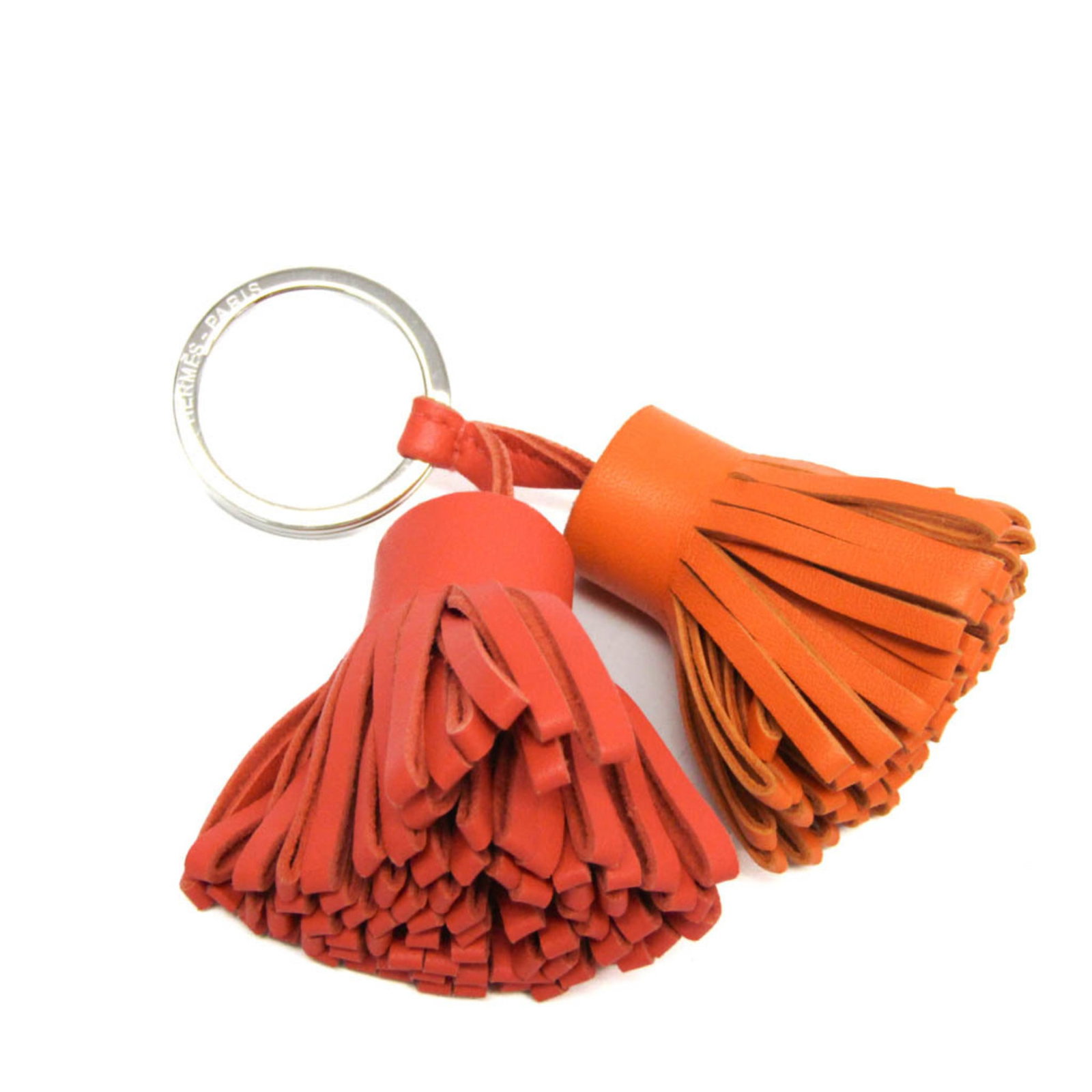 Keyring Agneau Milo Hermes: Keyring Agneau Milo Hermes Agneau Milo Hermes keyring is a unique accessory crafted from high-quality Agneau Milo material, offering a vibrant orange and pink color combination. Measuring 9.5cm x
