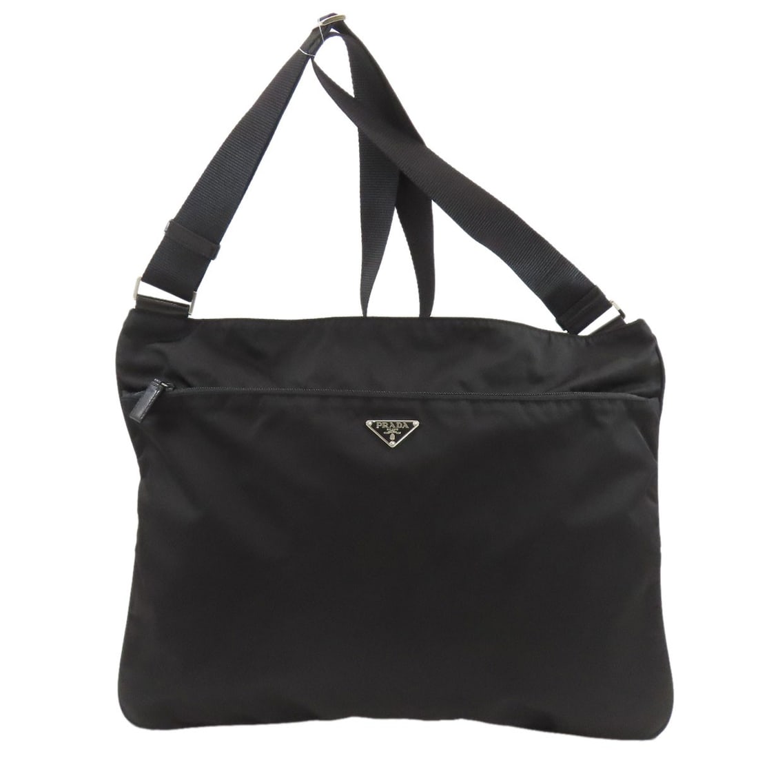 Shoulder Bag Nylon Prada Hardware Logo: Shoulder Bag Nylon Prada Hardware Logo Black nylon shoulder bag with Prada hardware logo. Made from durable nylon, this style features a sleek and modern design. The Prada hardware logo adds a touch o