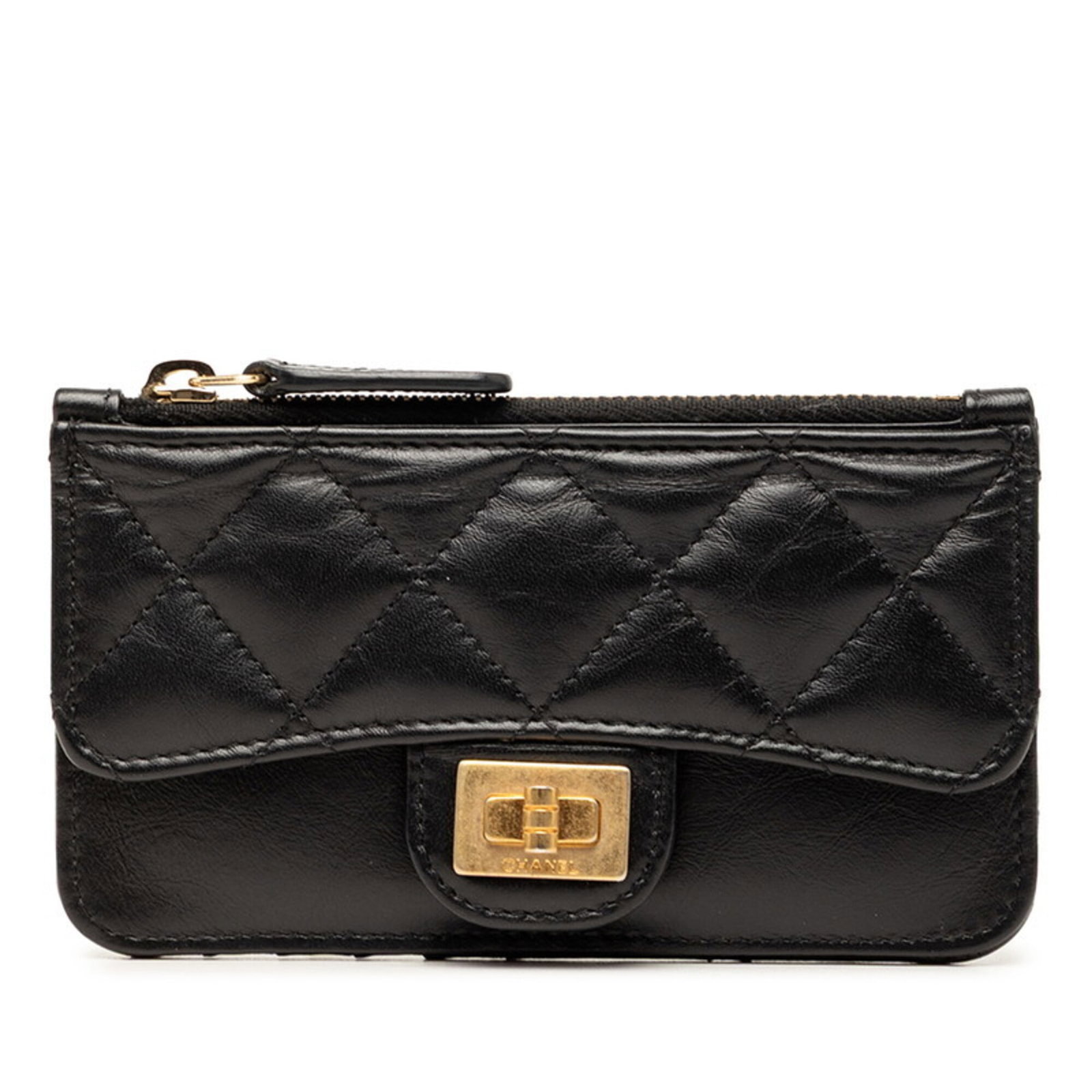 Coin purse in leather case: Coin purse in leather case This sleek leather coin purse is crafted from lambskin and features a classic design in black. Its compact size and smooth finish make it a versatile accessory for everyday
