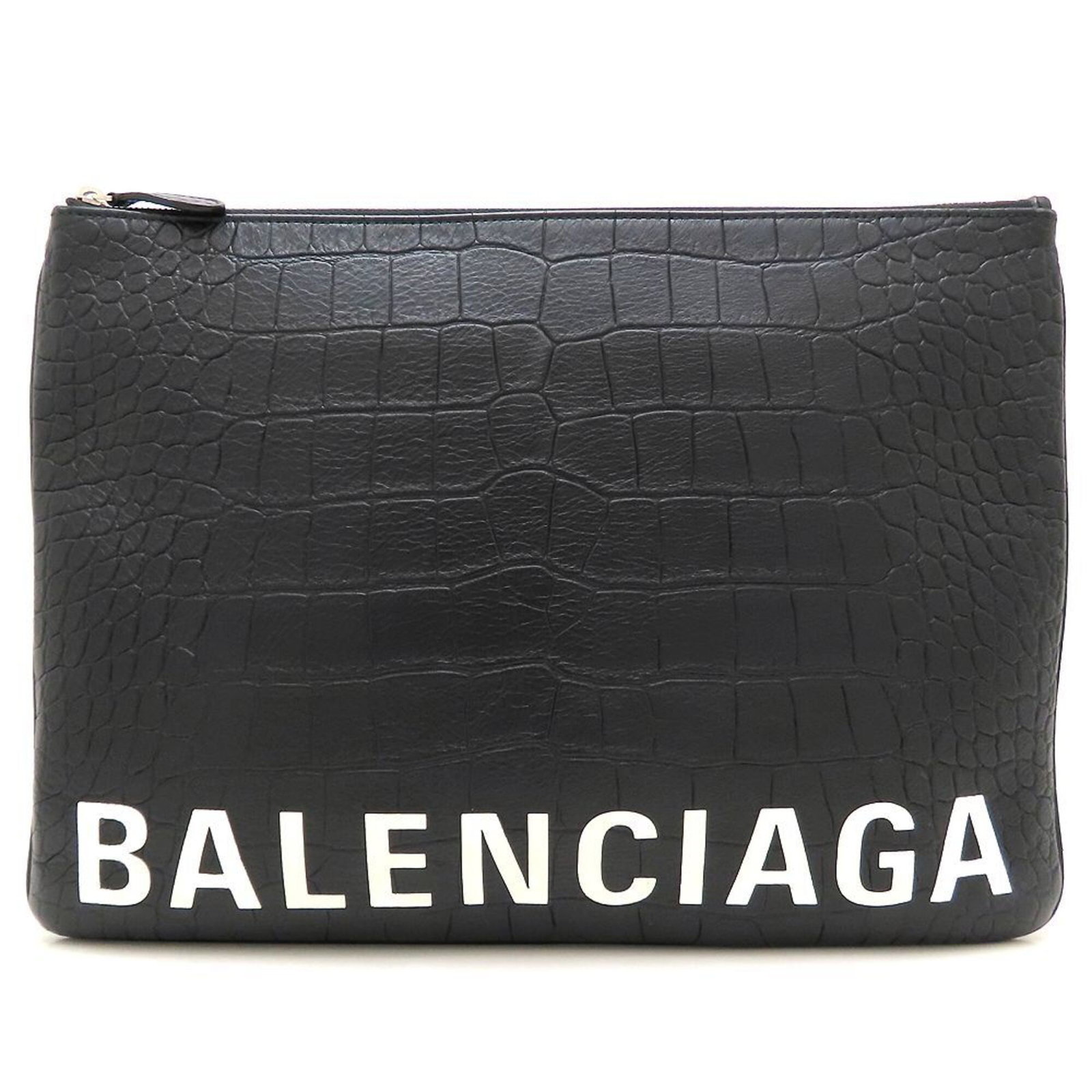 Clutch Bag Leather By Balenciaga: Clutch Bag Leather By Balenciaga Black leather clutch bag from Balenciaga, featuring a zipper closure and dimensions of 24.5cm x 34.5cm x 2cm. This stylish accessory is made from high-quality leather