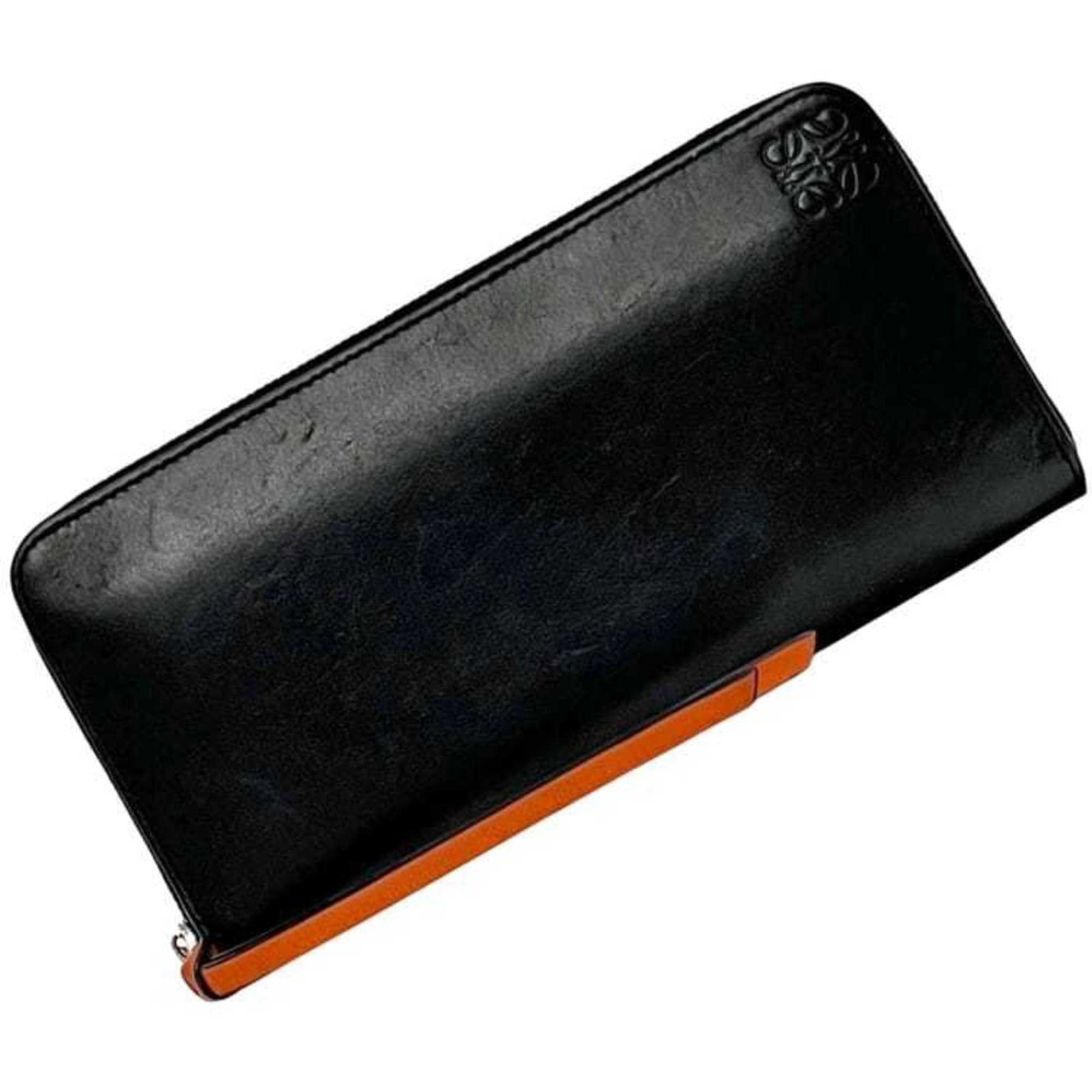 Leather Bi Fold Long Wallet: Leather Bi Fold Long Wallet Leather bi-fold long wallet with a sleek black design, featuring a classic bi-fold design and premium leather material. Measuring 9.8cm x 19cm x 1.8cm, this wallet is