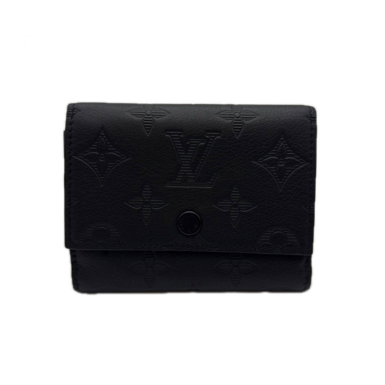 Louis Vuitton Wallet (Tri-Fold) Leather: Louis Vuitton Wallet (Tri-Fold) Leather Tri-fold leather wallet from Louis Vuitton, featuring calf leather construction and a classic monogram shadow design. The black color and RFID-blocking serial