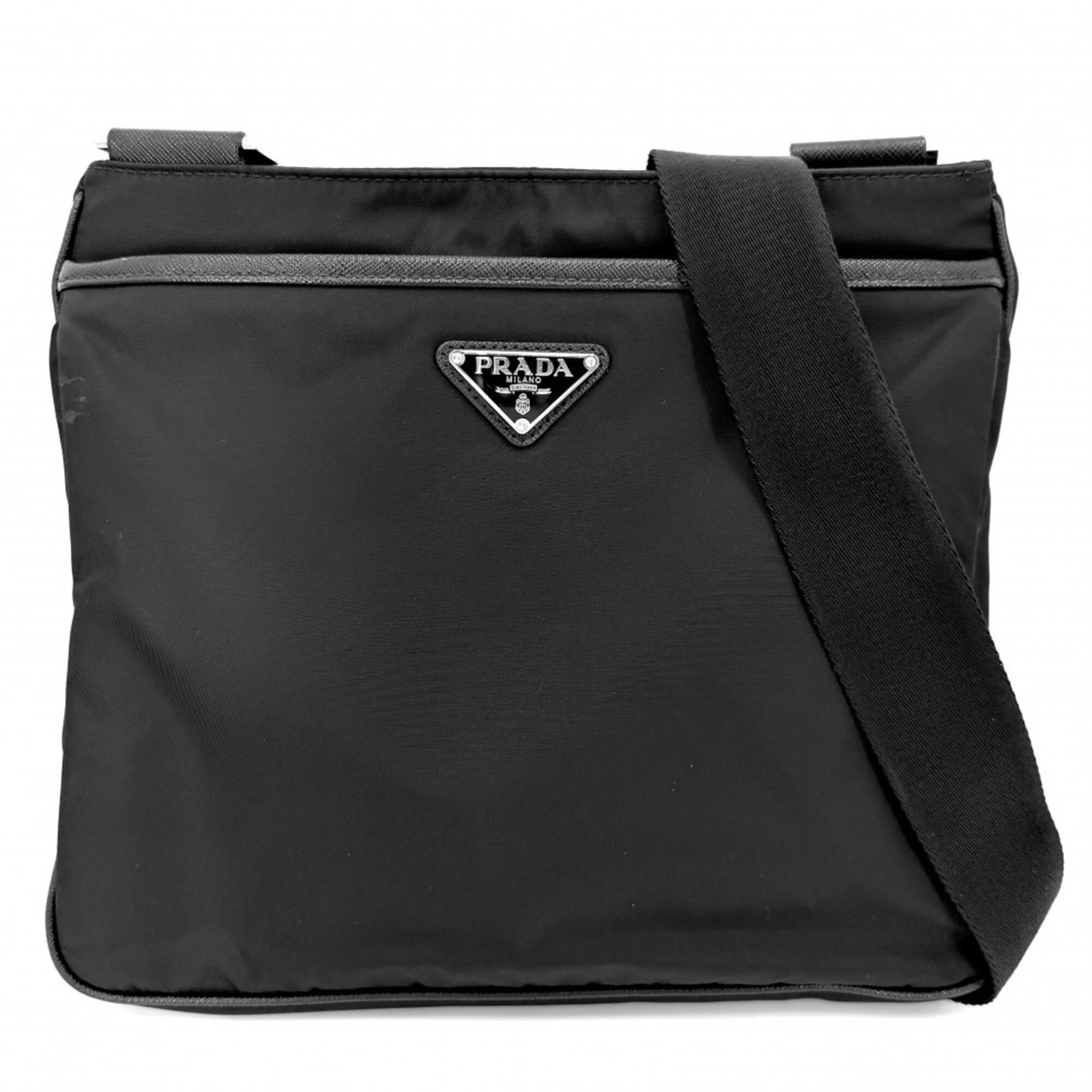 Shoulder Bag Nylon Leather Prada: Shoulder Bag Nylon Leather Prada Saffiano leather construction provides a durable and premium feel, while the nylon exterior adds a touch of modernity to this sleek shoulder bag. The classic design an
