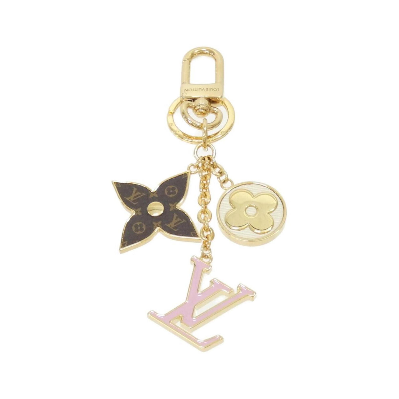 Keyring from Louis Vuitton: Keyring from Louis Vuitton Marron and Rose, a stylish combination, defines this Louis Vuitton keyring. The keyring features the iconic Louis Vuitton brand, adding a touch of luxury to any accessory. I