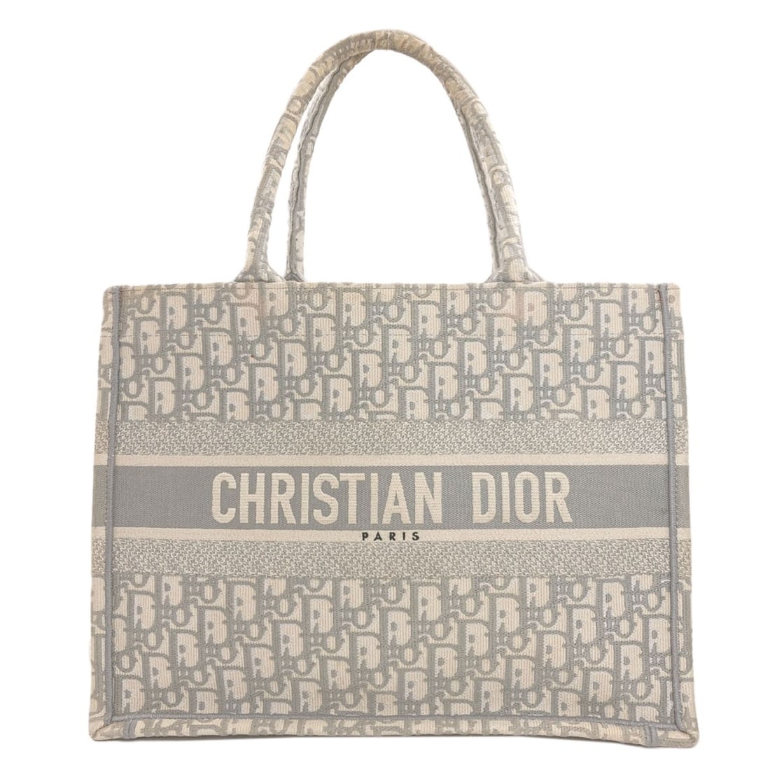 Canvas Christian Dior Bag Tote Book: Canvas Christian Dior Bag Tote Book Gray canvas tote bag from Christian Dior, featuring a classic tote style with a signature gray exterior. This canvas tote bag is a timeless and versatile