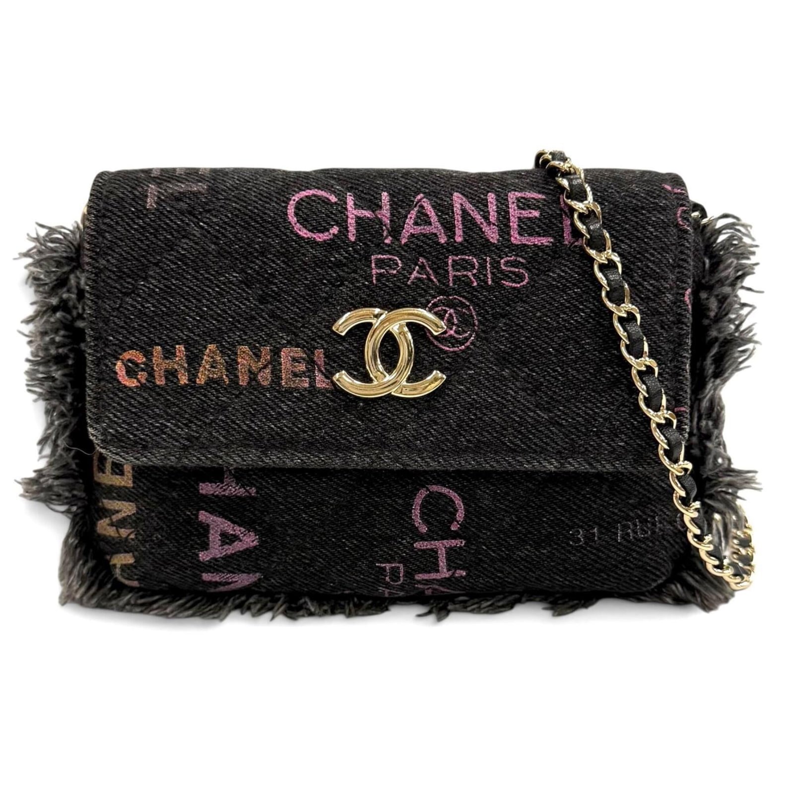 Chanel Shoulder Bag Denim Leather: Chanel Shoulder Bag Denim Leather Denim and leather come together in a sleek, black Chanel shoulder bag with a multi-color touch. Measuring 10.5cm x 16.5cm x 3cm, this compact bag is a stylish accesso