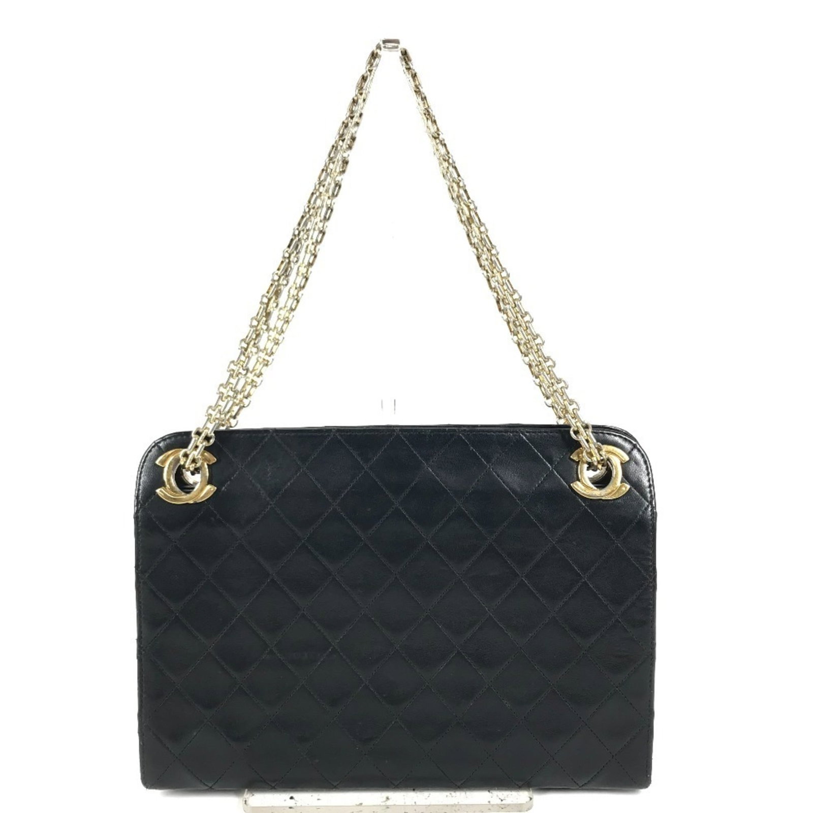 Shoulder Bag Leather Chanel: Shoulder Bag Leather Chanel Black leather shoulder bag from the iconic Chanel Matelasse line, crafted in France with a timeless design and classic ball clasp closure. This vintage bag features a