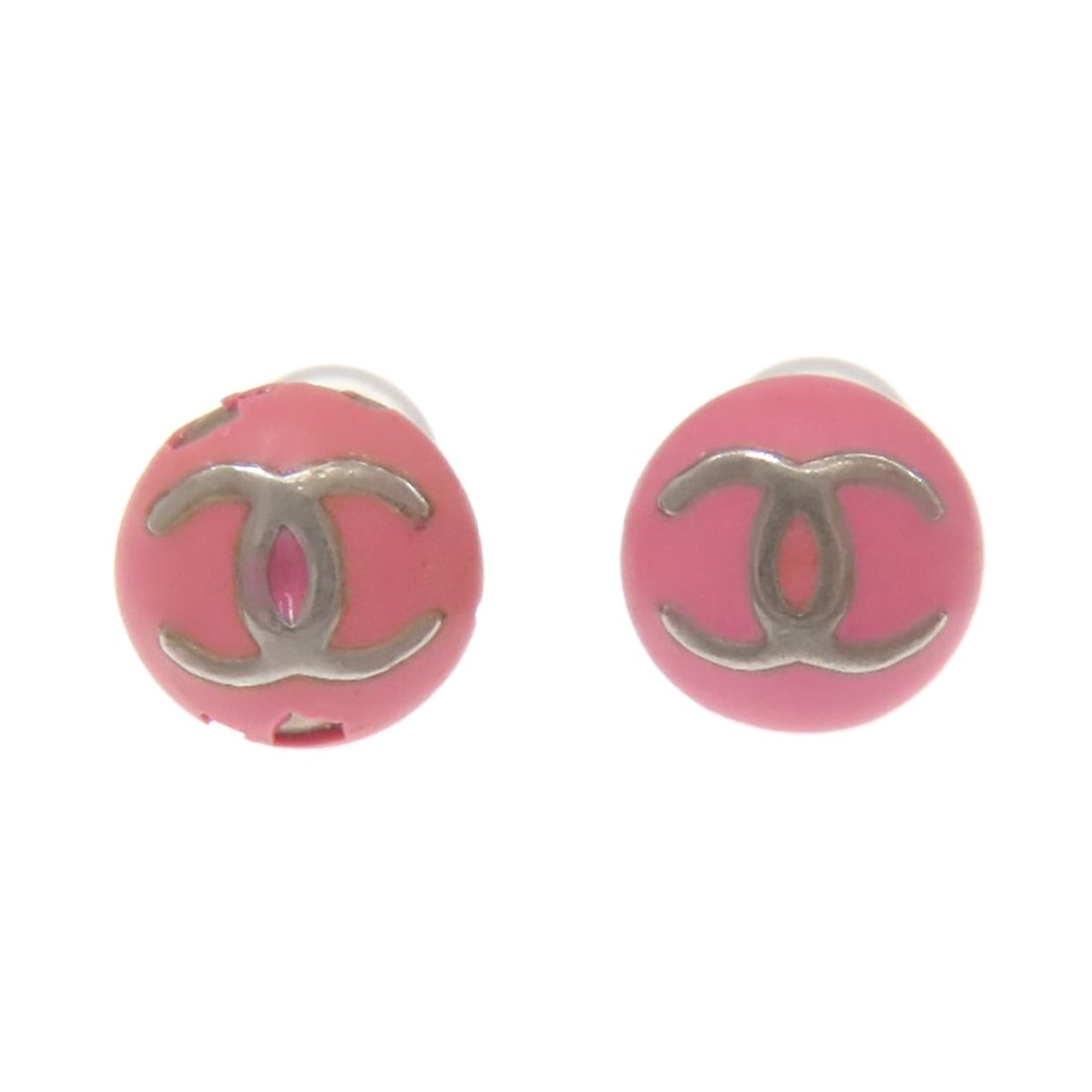Metal Mark Coco Chanel Earring: Metal Mark Coco Chanel Earring Metal Mark Coco Chanel Earring is a silver earring featuring the iconic CHANEL style. The earring bears a metal mark, a notable detail of its design. Item Specifics: