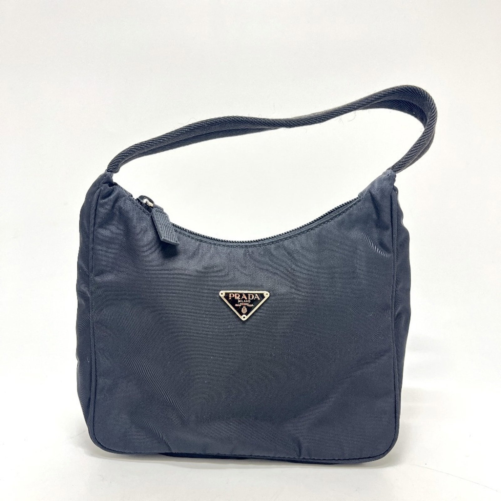 Shoulder Bag Nylon Handbag Prada: Shoulder Bag Nylon Handbag Prada Black Nylon Prada Shoulder Bag with Classic Design. This 14cm x 20cm x 7cm shoulder bag features a timeless design made from high-quality nylon material. A stylish