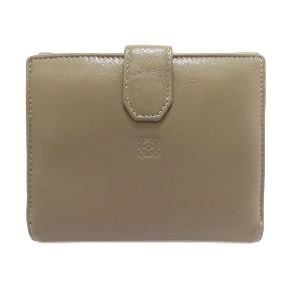 Loewe Anagram Bifold Wallet With Coin Pocket Lambskin: Loewe Anagram Bifold Wallet With Coin Pocket Lambskin The Loewe Anagram Bifold Wallet with Coin Pocket Lambskin boasts a striking green lambskin exterior, featuring a sleek bifold design with a conven