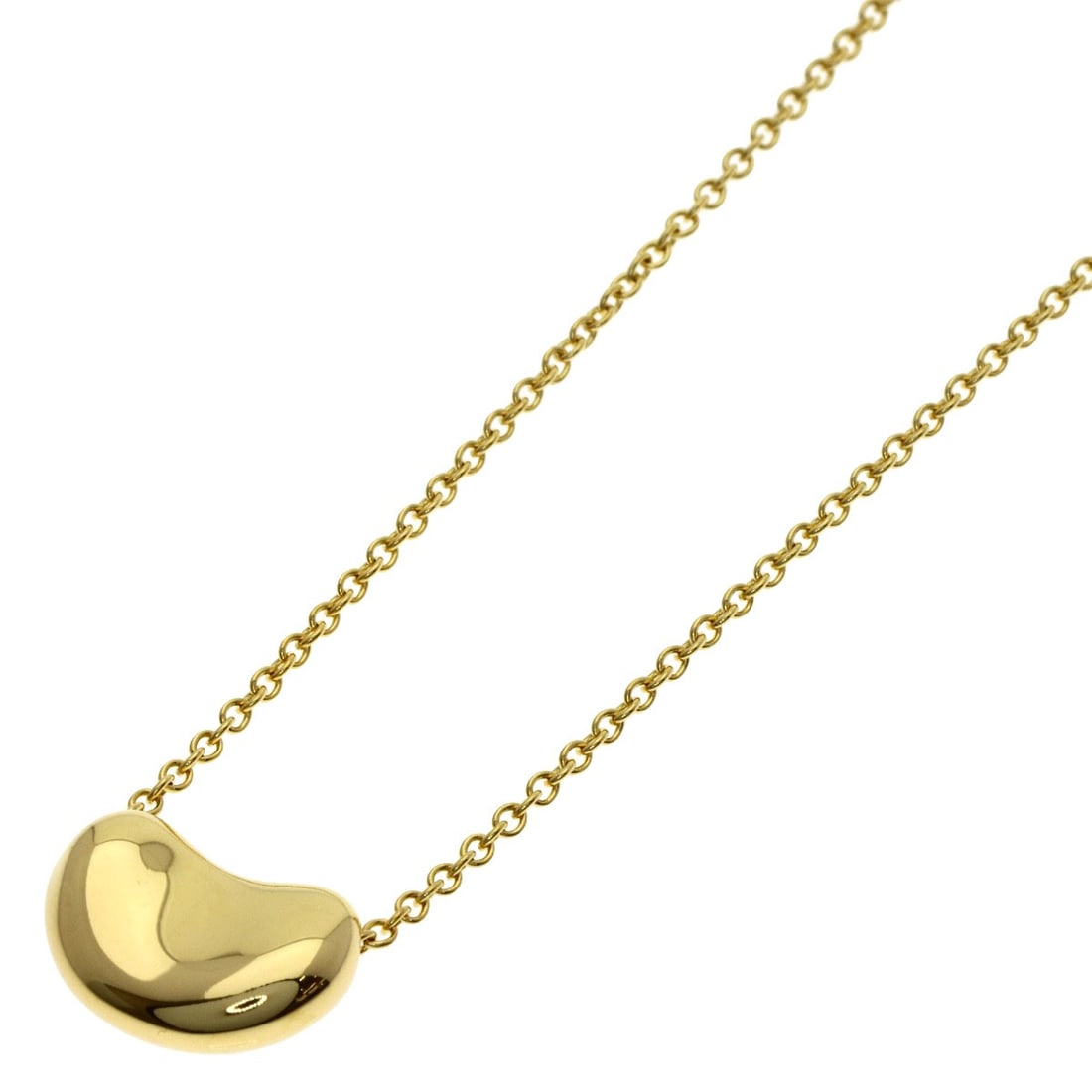 Yellow Gold Tiffany&Co K18 Bean Necklace: Yellow Gold Tiffany&Co K18 Bean Necklace Yellow Gold Tiffany&Co K18 Bean Necklace is a K18 yellow gold necklace with an open closure, measuring 15.9 inches in length. This piece features the iconic