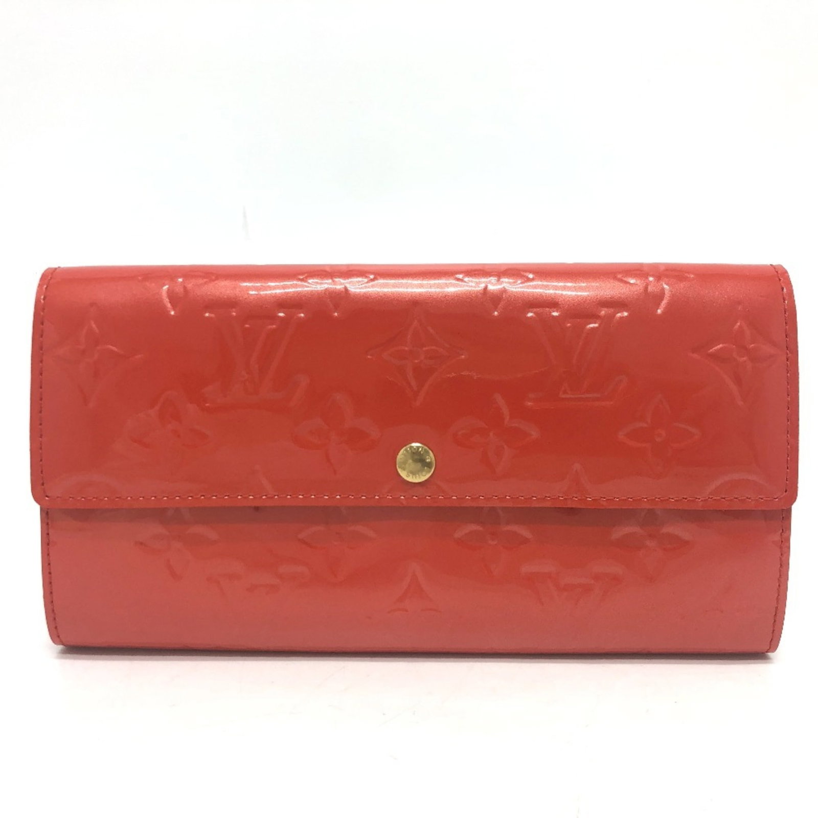 Louis Vuitton Long Wallet (Bi-Fold) Monogram Vernis: Louis Vuitton Long Wallet (Bi-Fold) Monogram Vernis Monogram Vernis, a vibrant orange hue, adorns this Louis Vuitton Long Wallet (Bi-Fold), adding a pop of color to any outfit. The iconic monogram