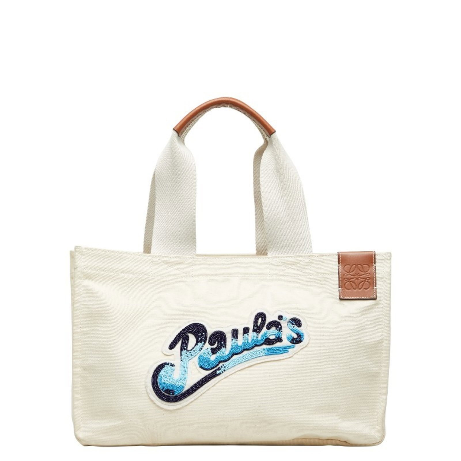 Canvas tote bag Loewe: Canvas tote bag Loewe Canvas tote bag Loewe features a classic design with a blue, ivory, and white color scheme. The open closure and spacious interior make it a practical and stylish accessory.