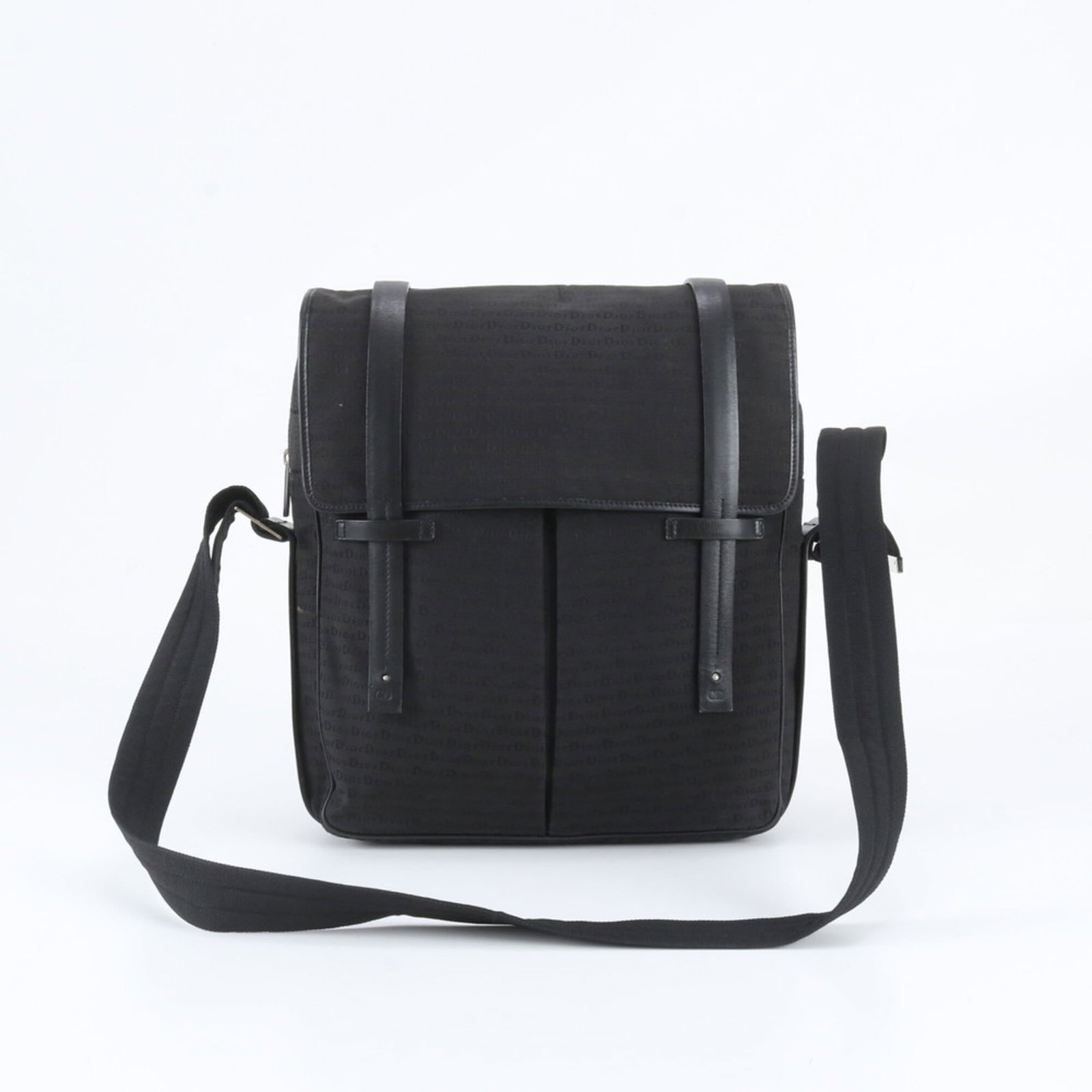 Nylon Leather Dior Tote Christian Bag Messenger Shoulder Bag: Nylon Leather Dior Tote Christian Bag Messenger Shoulder Bag Black leather and nylon Christian Dior bag with a classic messenger design, measuring 34cm x 29cm x 7cm. The bag's sleek black color and