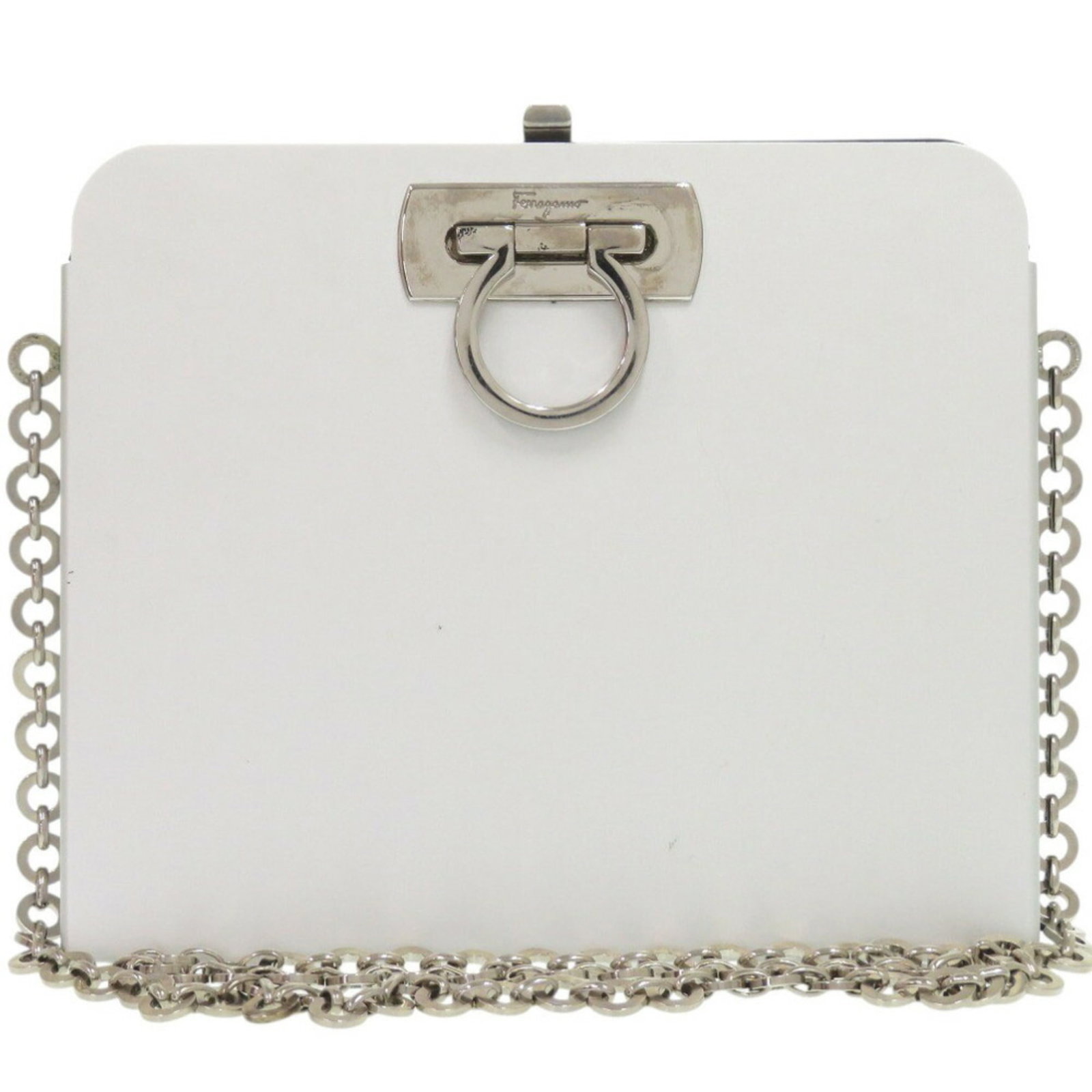 Aluminum Shoulder Bag by Ferragamo Salvatore: Aluminum Shoulder Bag by Ferragamo Salvatore The Salvatore Ferragamo Aluminum Shoulder Bag is a sleek and modern accessory, crafted from durable aluminum with a silver finish. Measuring 17cm x 20.5cm 