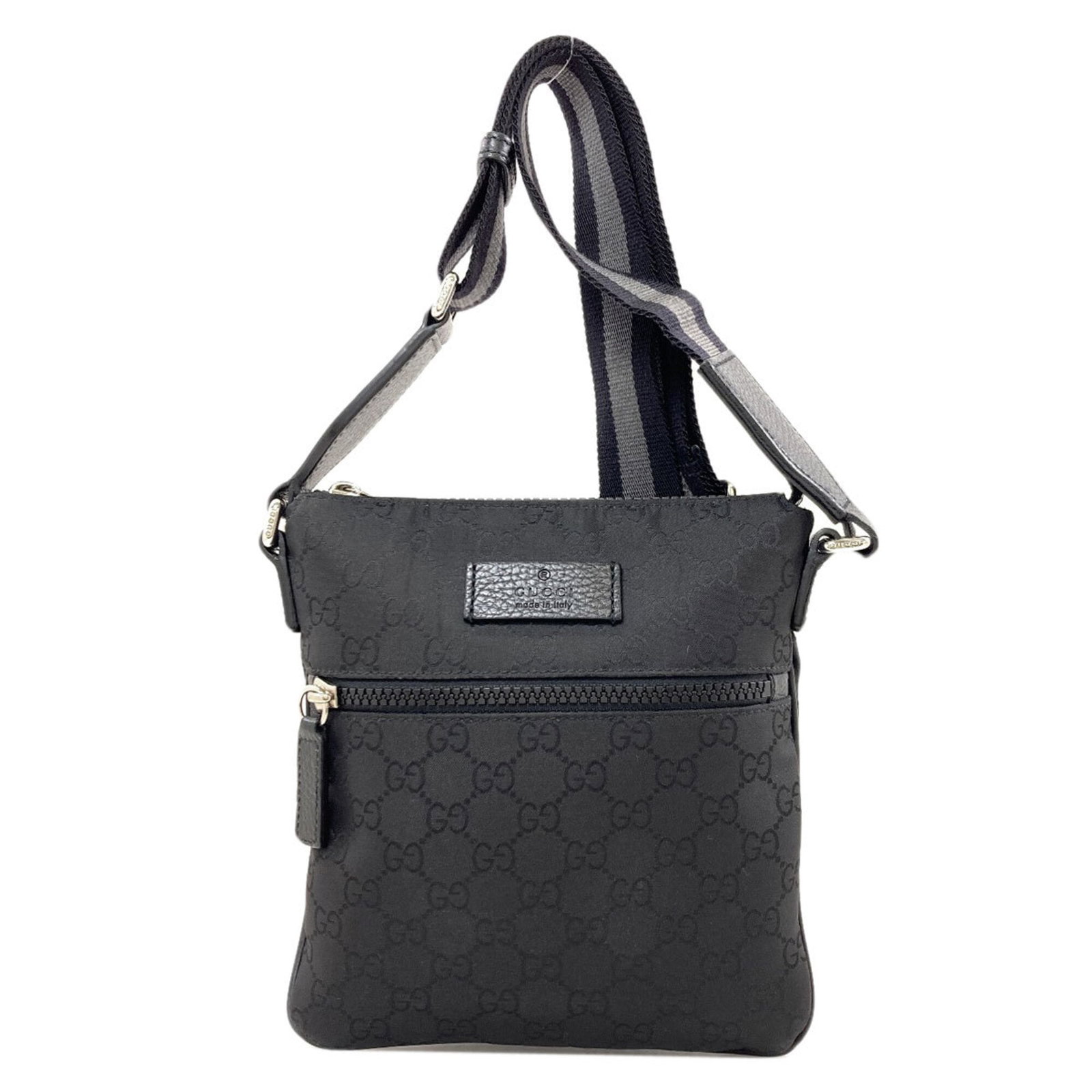 Shoulder Bag Nylon Gucci: Shoulder Bag Nylon Gucci Black Nylon Gucci Shoulder Bag with Classic Design. This 20.5cm x 19cm x 1cm shoulder bag is made of high-quality nylon and features a timeless black color. Its sleek