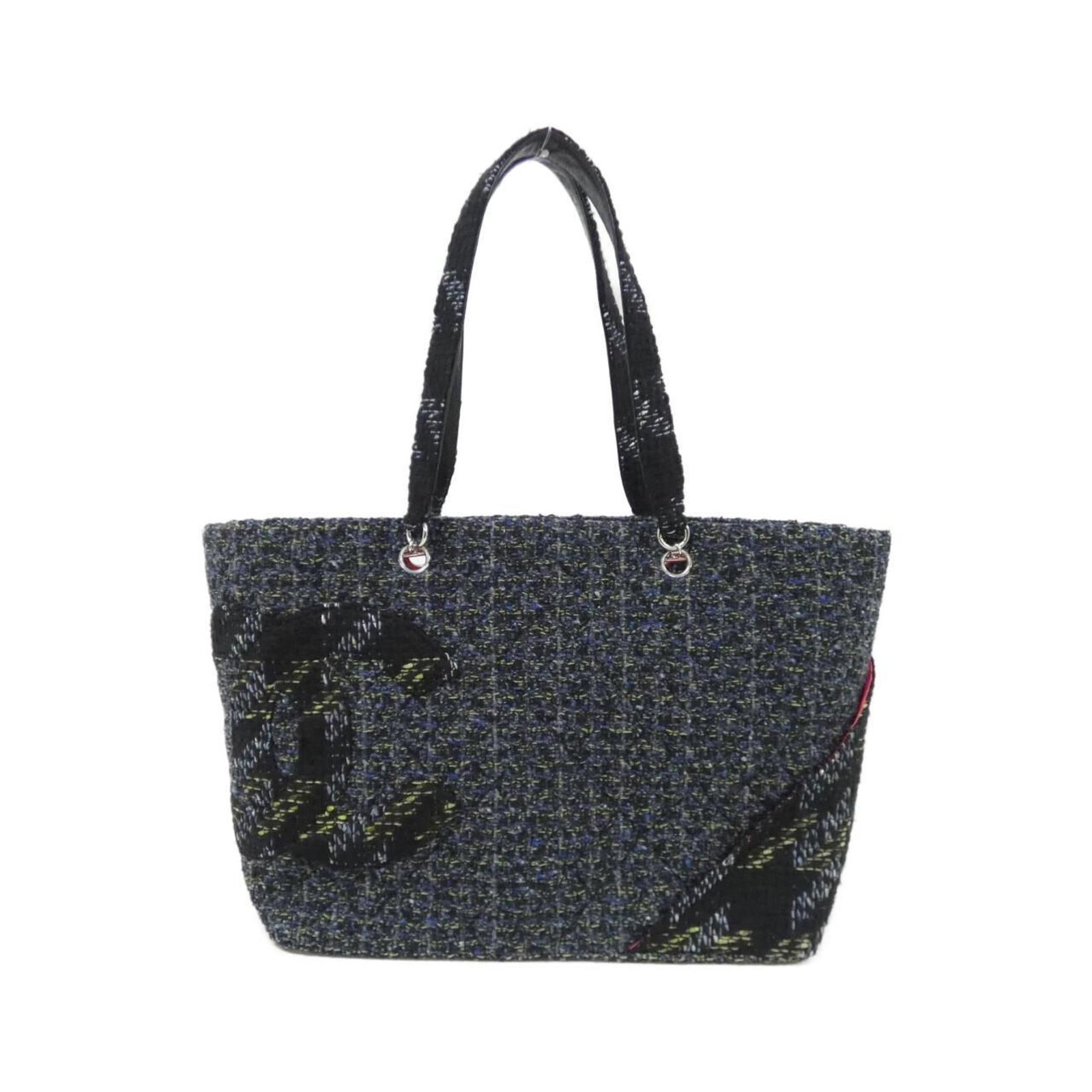 Tweed shoulder bag by Chanel: Tweed shoulder bag by Chanel Tweed shoulder bag by Chanel, featuring a classic navy color and silver hardware, is a timeless piece of women's fashion. Measuring 28cm x 46cm x 15cm, it boasts a sturdy