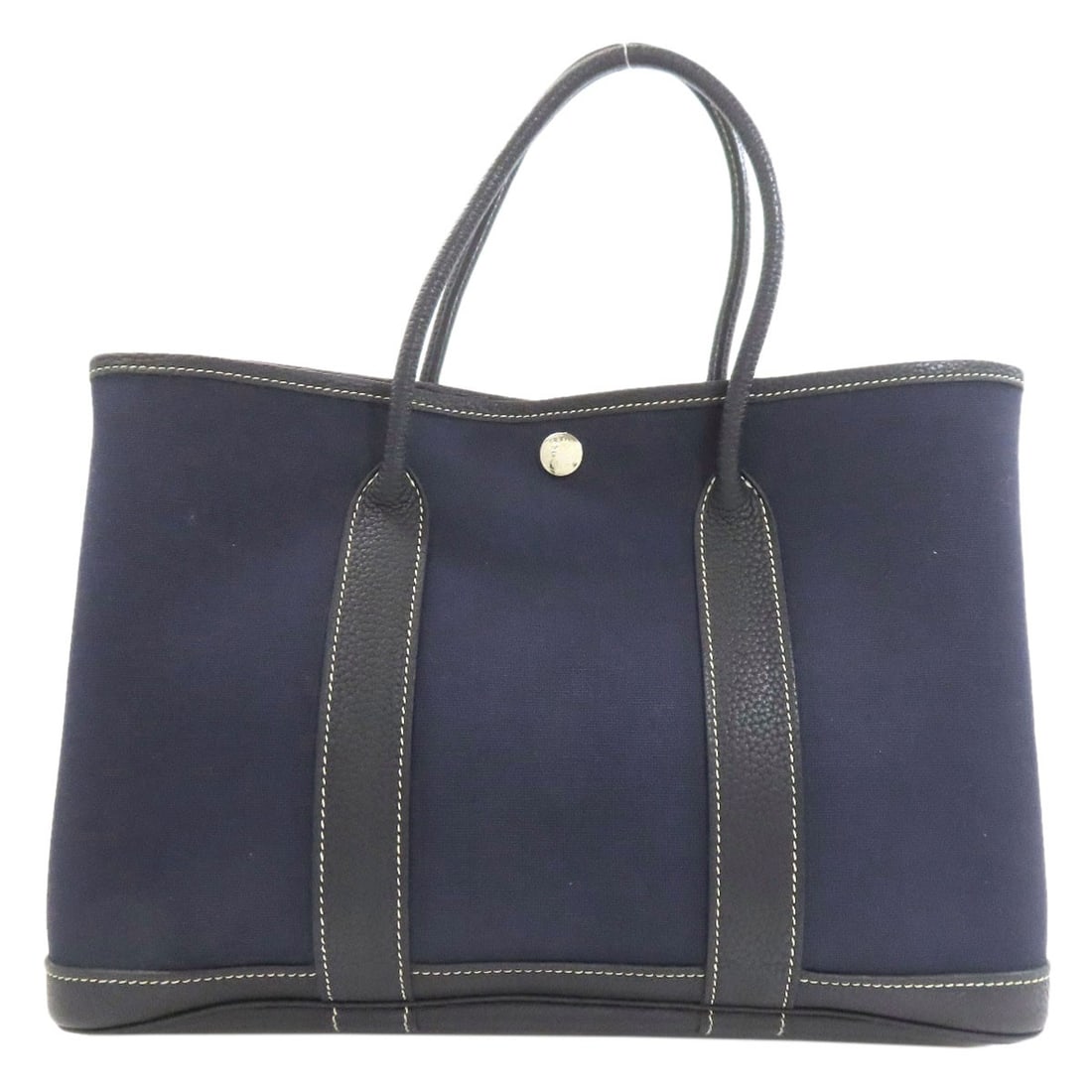 Hermes Garden Party Tpm Silverhardware World Festival Limited Edition Tote: Hermes Garden Party Tpm Silverhardware World Festival Limited Edition Tote Navy tote bag with silver hardware, featuring a distinctive World Festival Limited Edition design, bears a signature. Made
