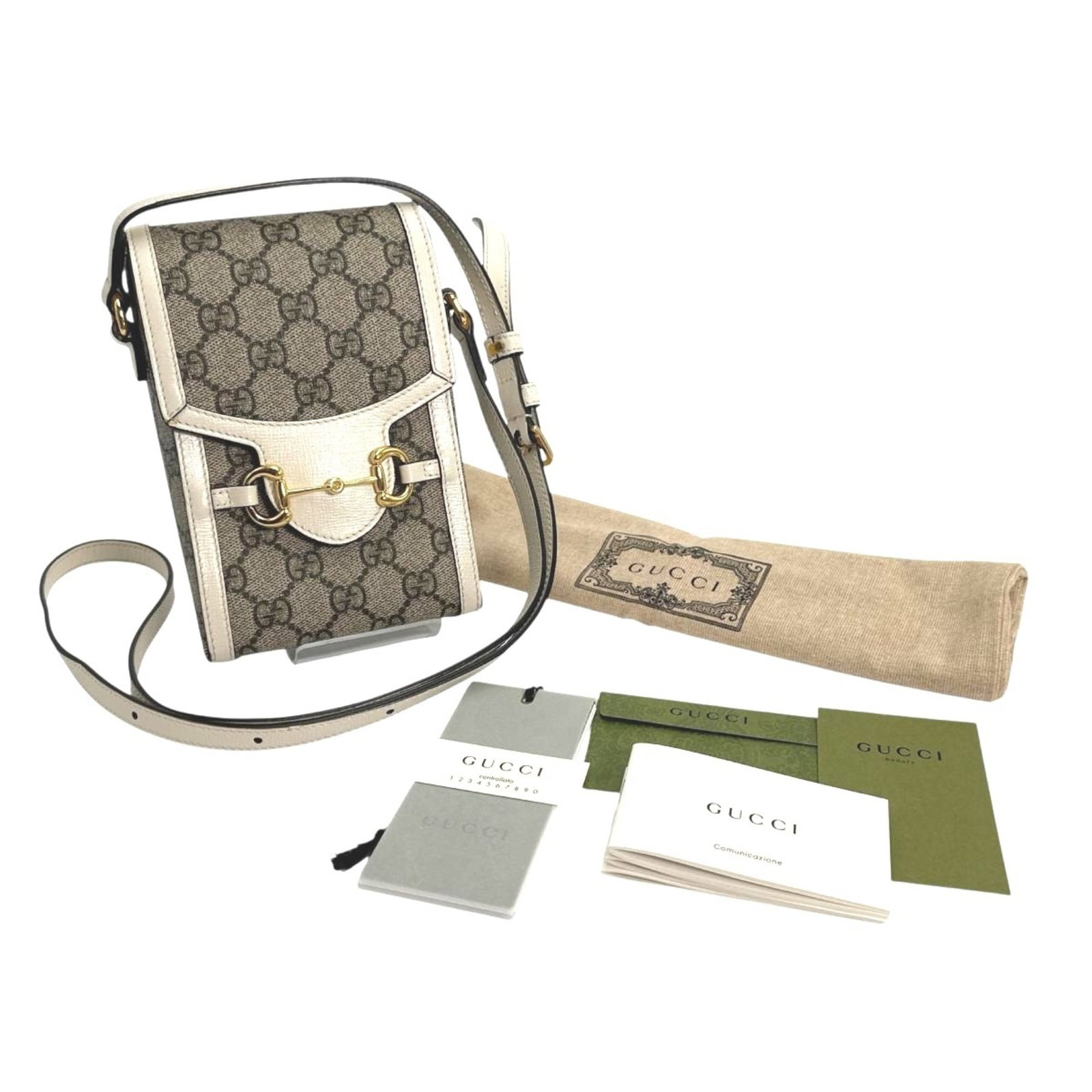 Shoulder Bag Gg Canvas: Shoulder Bag Gg Canvas Gucci's GG canvas shoulder bag boasts a timeless design with a beige color that adds a touch of elegance to any outfit. Measuring 18cm x 12cm x 4.5cm, this compact bag comes wit