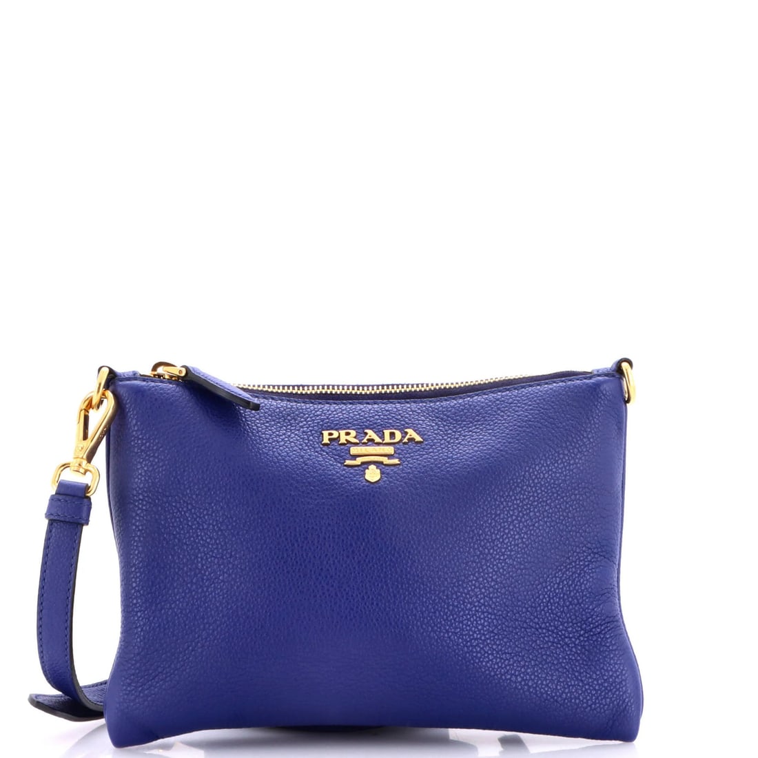Prada Flat Zip Crossbody Bag Vitello Daino Mini: Prada Flat Zip Crossbody Bag Vitello Daino Mini The Prada Flat Zip Crossbody Bag Vitello Daino Mini is a stylish mini crossbody bag featuring a sleek blue exterior made from high-quality leather. With