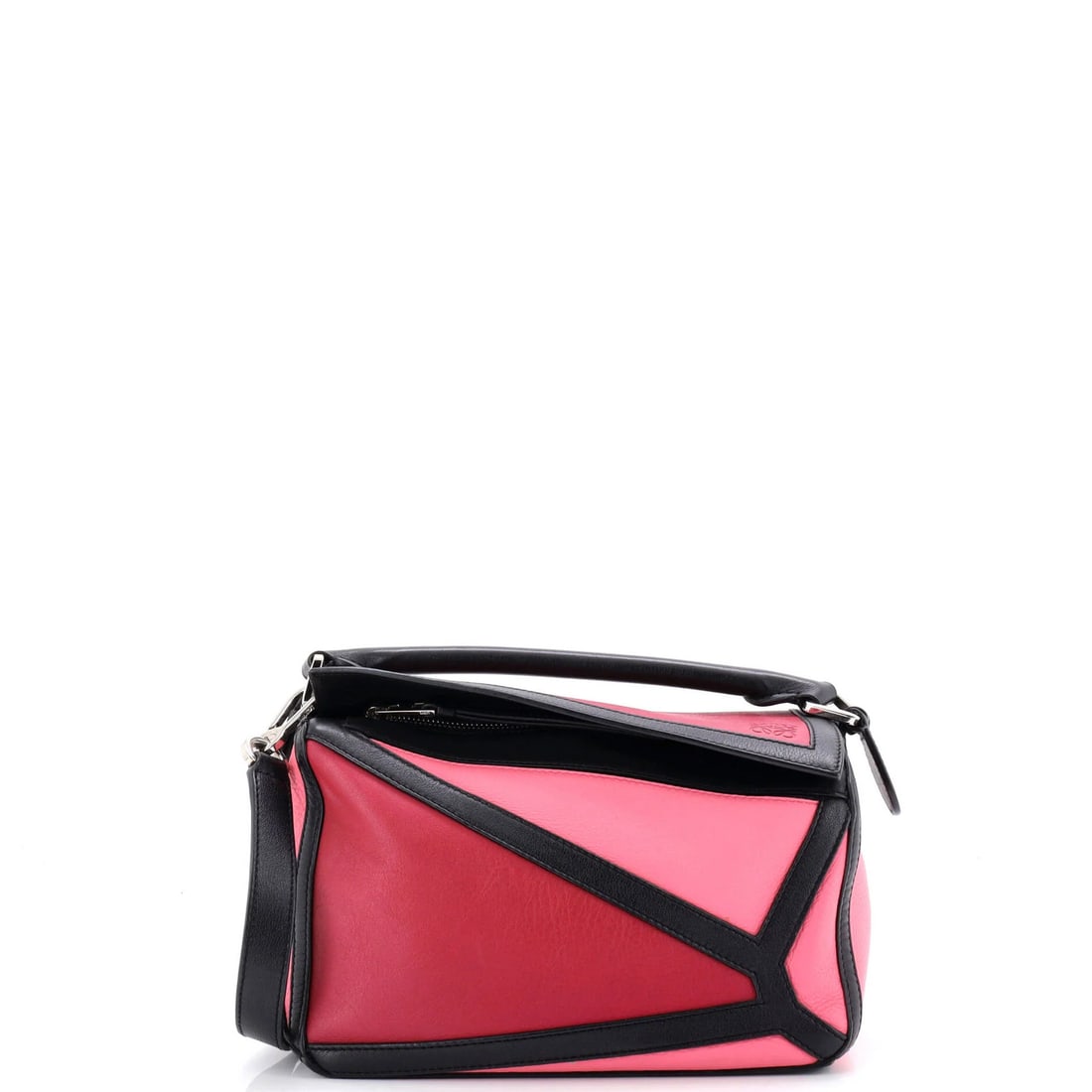 Small Leather Puzzle Bag Loewe: Small Leather Puzzle Bag Loewe Small Leather Puzzle Bag Loewe. This pink leather satchel features a classic design with a small size and adjustable strap. With its signature Loewe hardware and