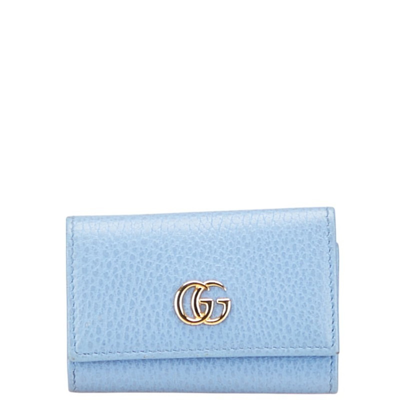 Keycase Leather Gucci: Keycase Leather Gucci Keycase Leather Gucci is a stylish accessory featuring a light blue color and made from high-quality leather. It comes with a box and dust bag for added protection and
