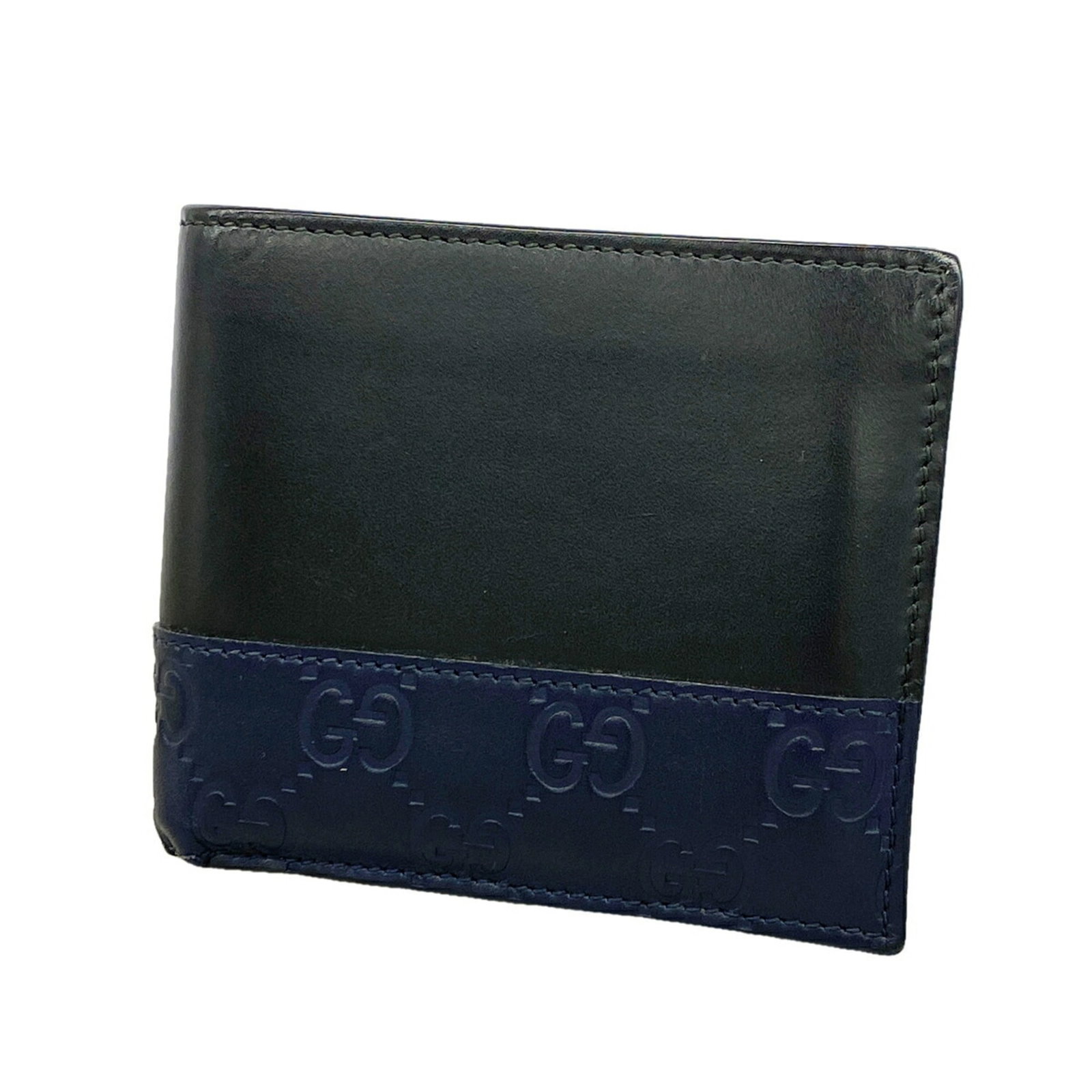 Gucci Wallet (Bi-Fold) Leather: Gucci Wallet (Bi-Fold) Leather Black or Navy Gucci bi-fold leather wallet with dimensions 9.5cm x 11cm x 2cm. Made from high-quality leather, this wallet features a classic design that is both stylish