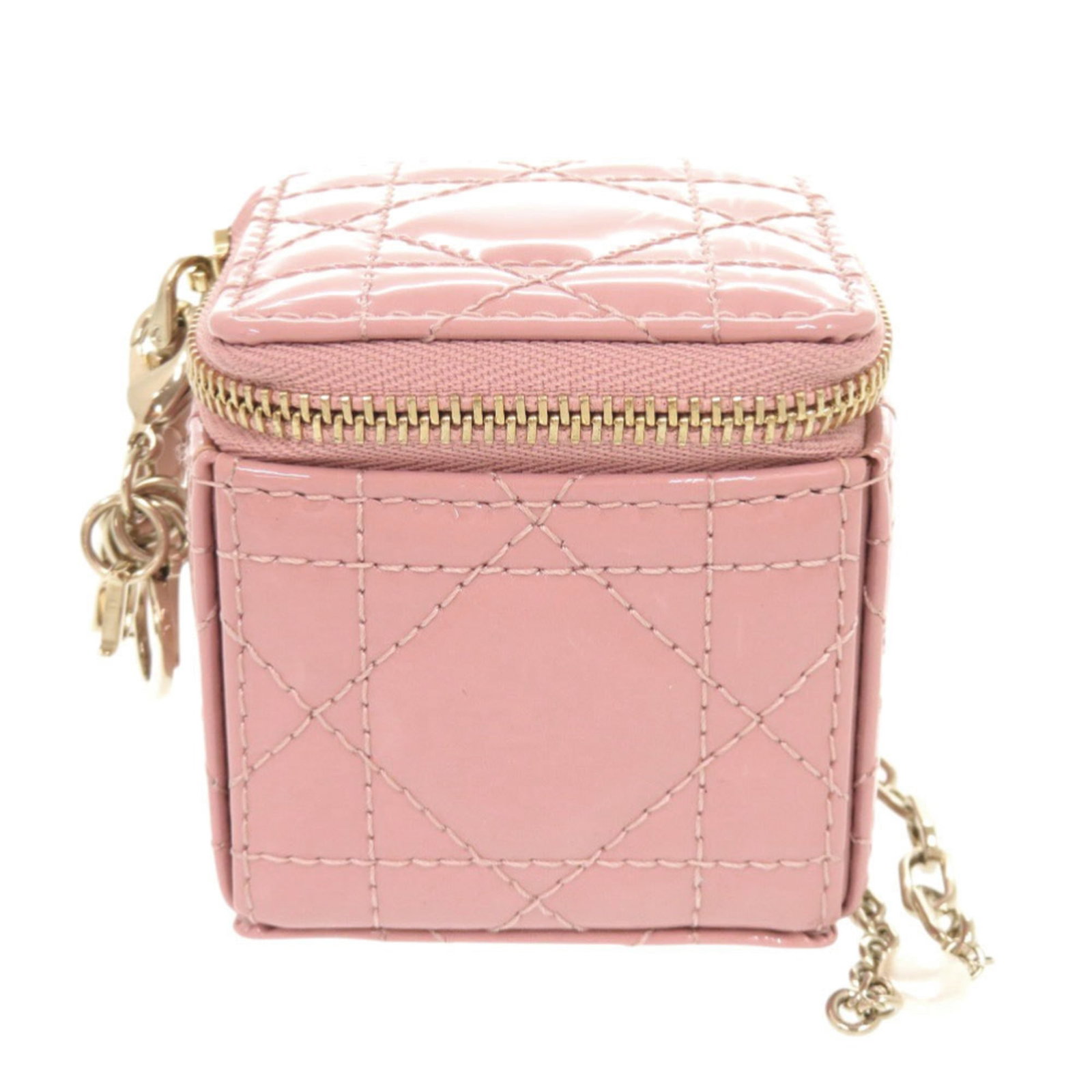 Patent Leather Dior Pouch Christian: Patent Leather Dior Pouch Christian Patent leather Dior Pouch Christian is a small, pink pouch made from patent leather, measuring 6.5cm x 6.5cm x 6.5cm. The pouch bears a signature and is of Italian 