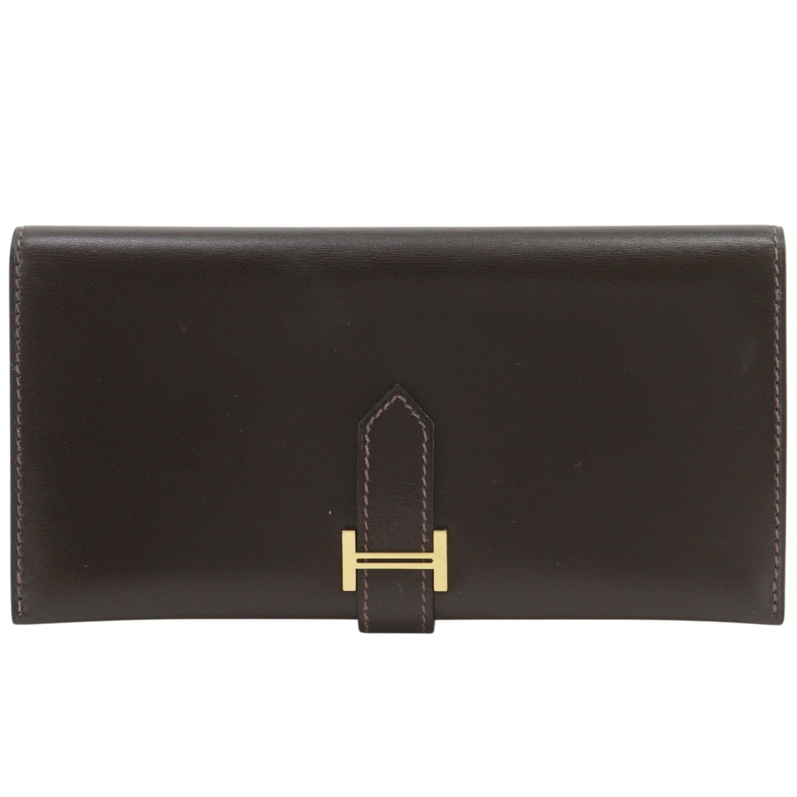 Box calf leather bi-fold wallet from Hermes: Box calf leather bi-fold wallet from Hermes Box calf leather bi-fold wallets from Hermes are crafted with attention to detail, featuring a classic design. Made from high-quality box calf leather,