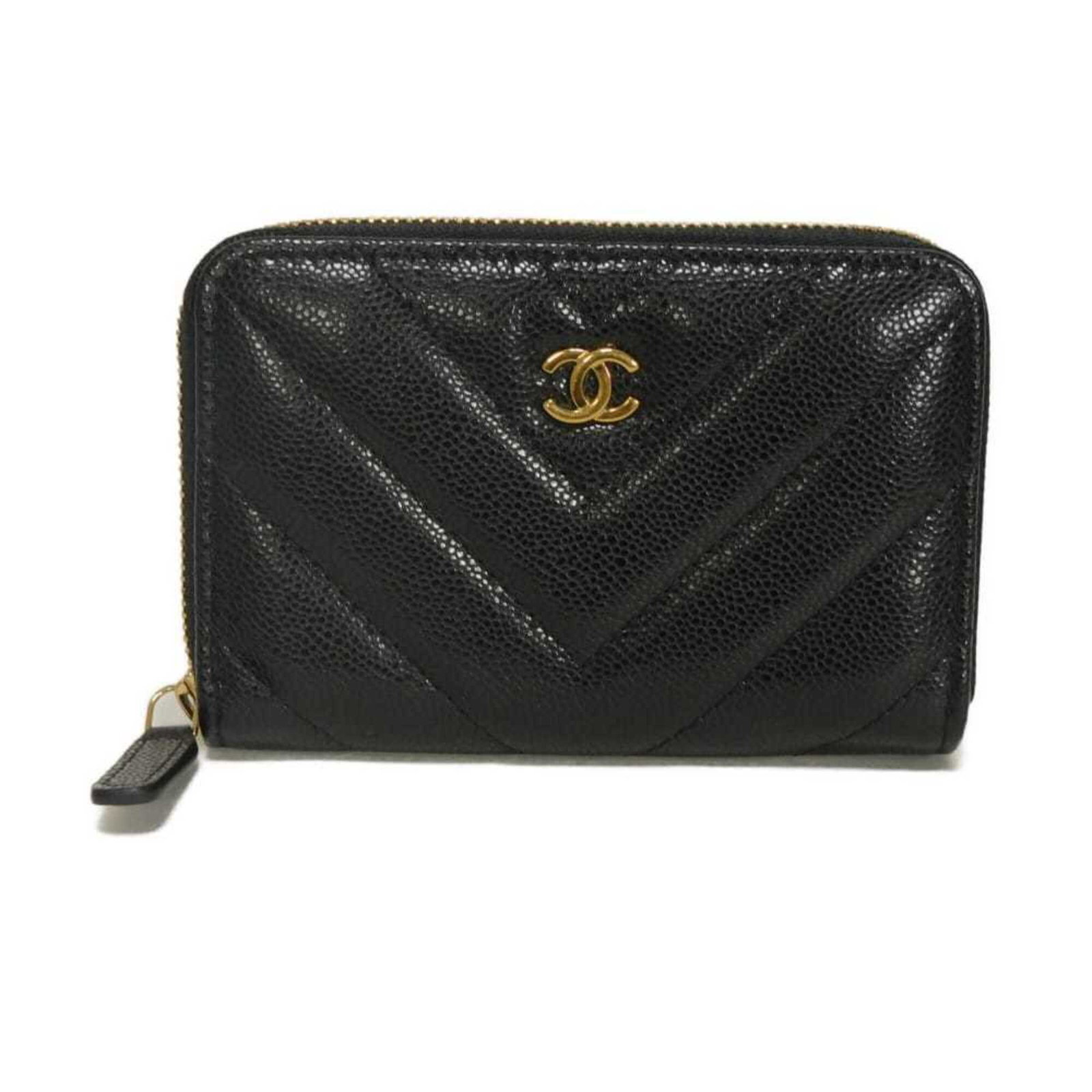 Coin purse in leather case: Coin purse in leather case Made from high-quality calfskin leather, this sleek coin purse features a classic design with a zipper closure. Measuring 8cm x 12cm x 2cm, it's a compact and stylish