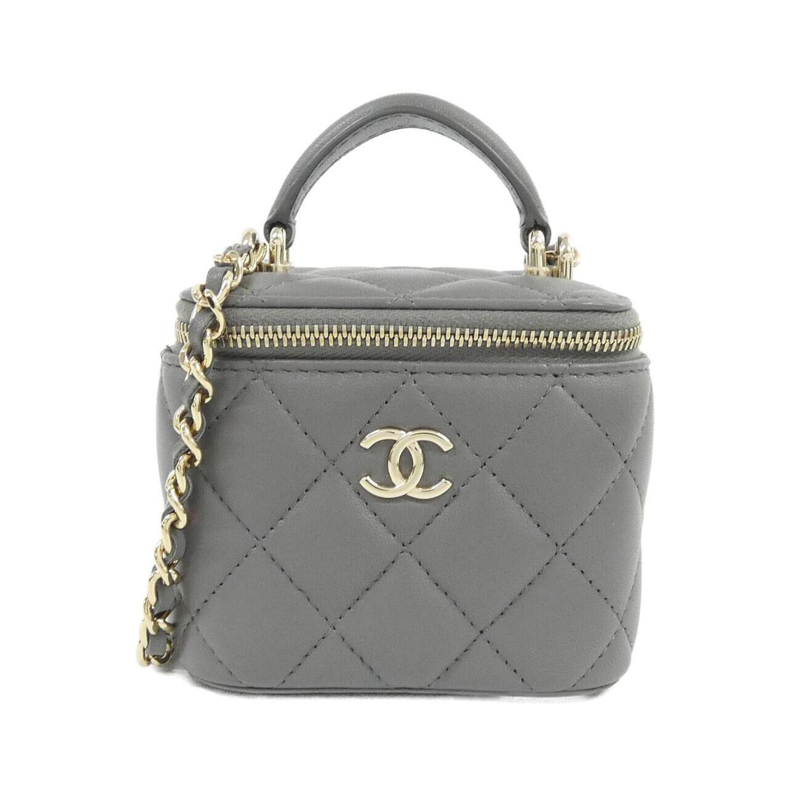 Handbag Leather from Chanel: Handbag Leather from Chanel Lamb leather handbag from Chanel, featuring a sleek gray color and gold hardware, measures 9cm x 10cm x 7cm. This luxurious leather handbag is crafted from high-quality