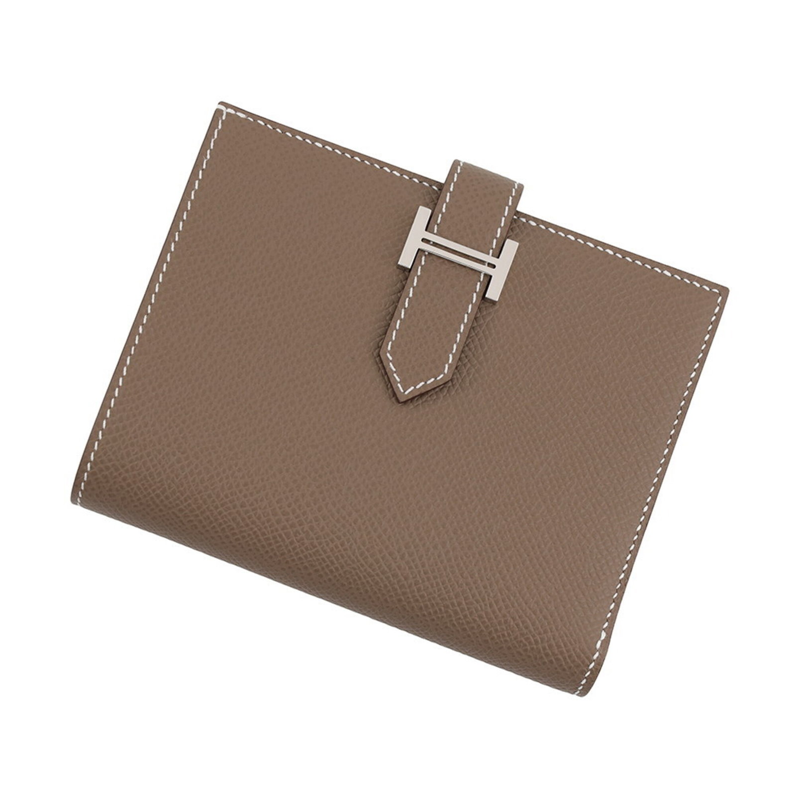 Bi fold Epsom Leather Hermes Wallet: Bi fold Epsom Leather Hermes Wallet Epsom leather provides a rich, luxurious feel to this bi-fold wallet from Hermes, featuring a sophisticated Etoupe gray color. The compact size and sleek design
