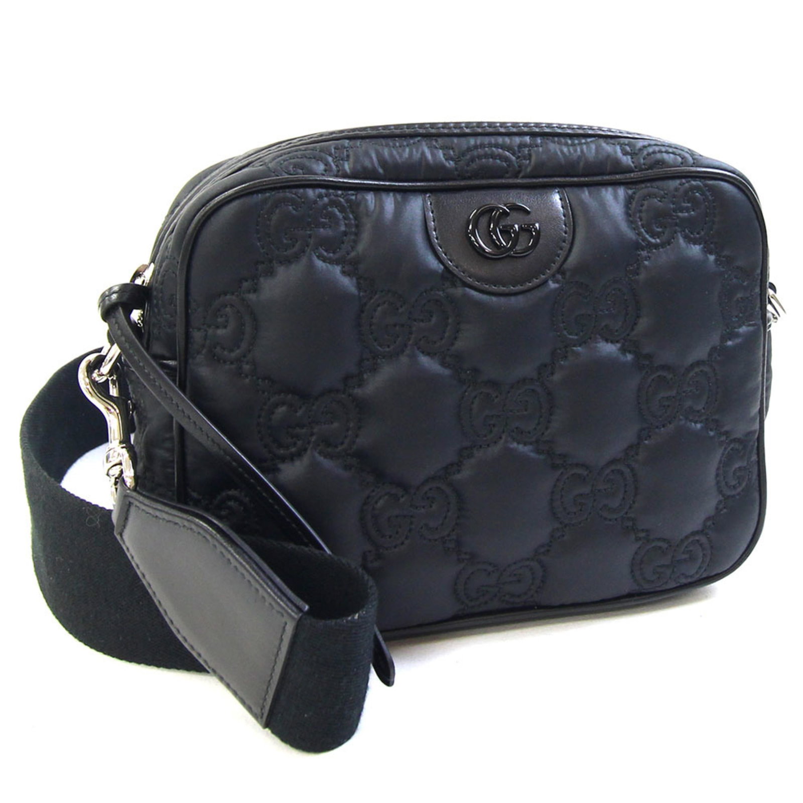 Nylon Leather Bag Shoulder Gucci: Nylon Leather Bag Shoulder Gucci Nylon and leather combine in this sleek Gucci shoulder bag, measuring 16cm x 21cm x 7cm. The black color provides a versatile backdrop for everyday use. A signature